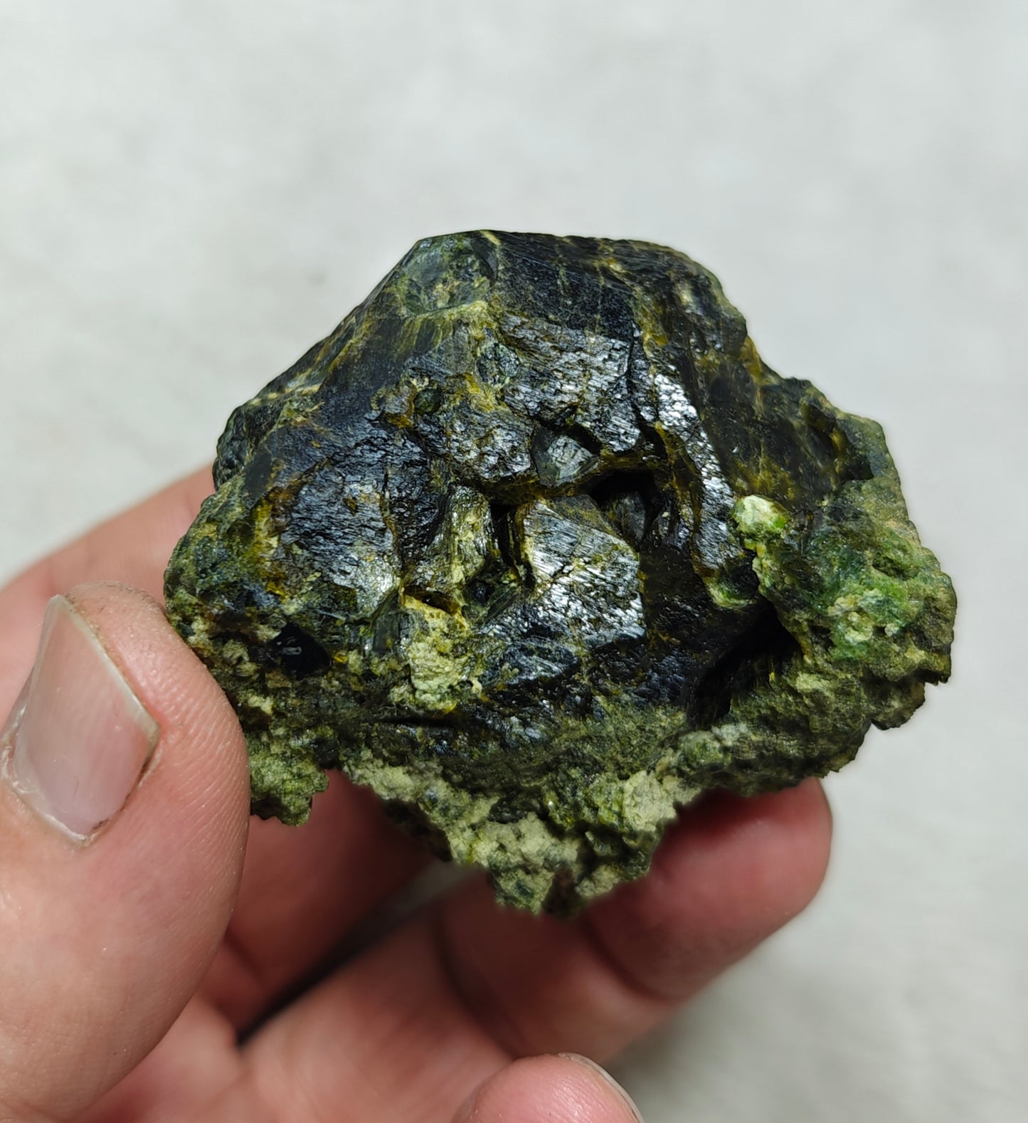 Natural green garnet variety demantoid crystal 142 grams