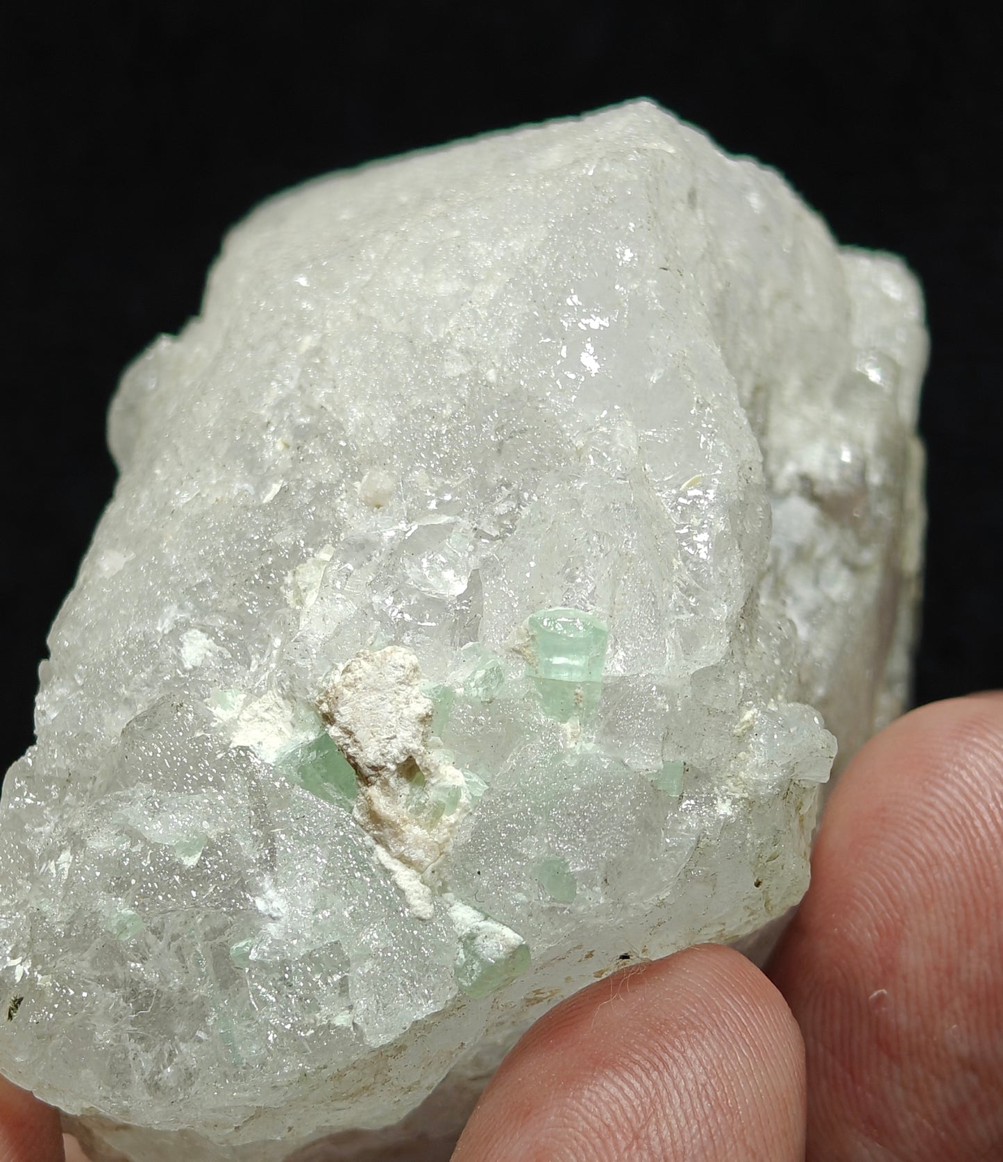Natural etched pollucite with green tourmalines 260 grams