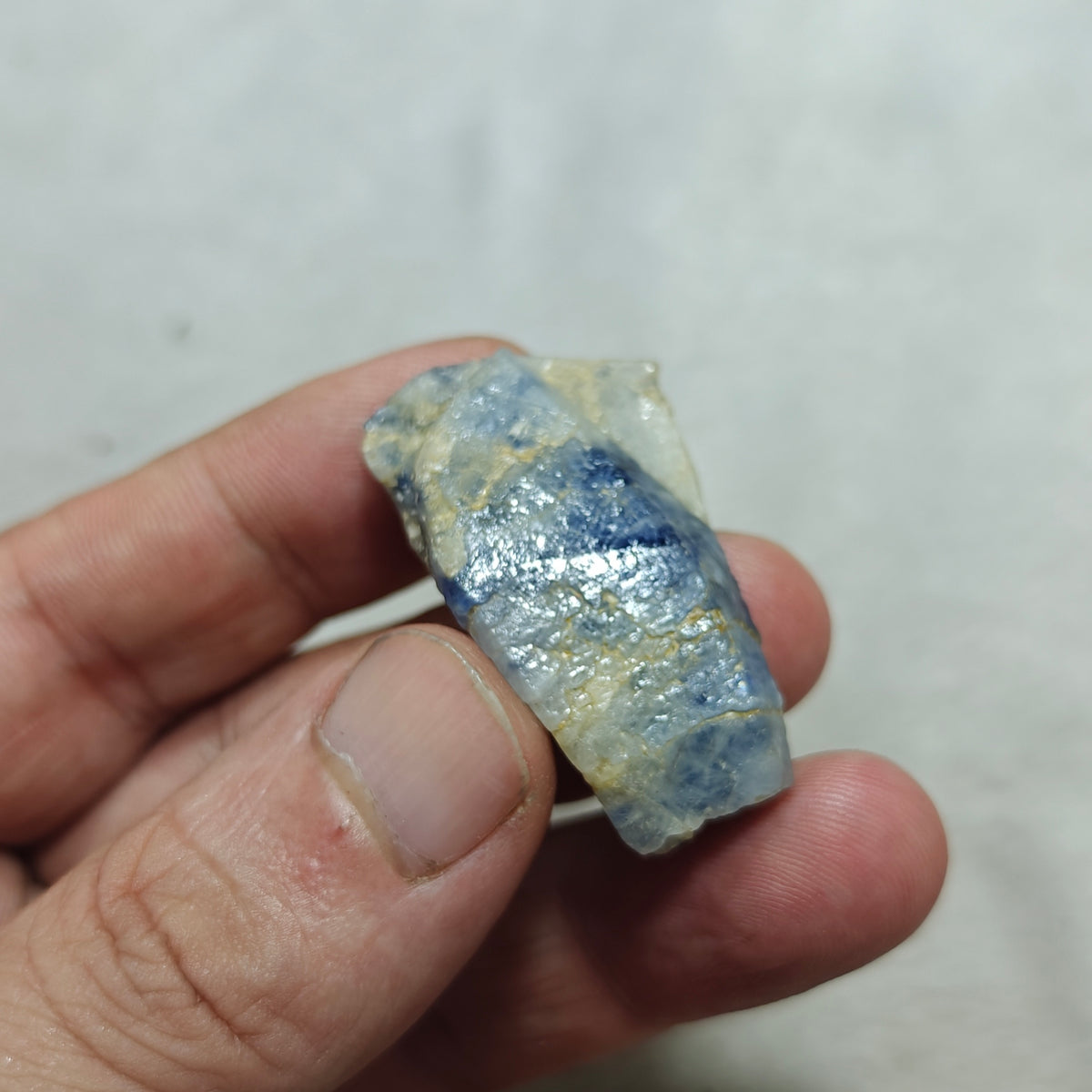 Natural Terminated blue sapphire crystal with some matrix 24 grams