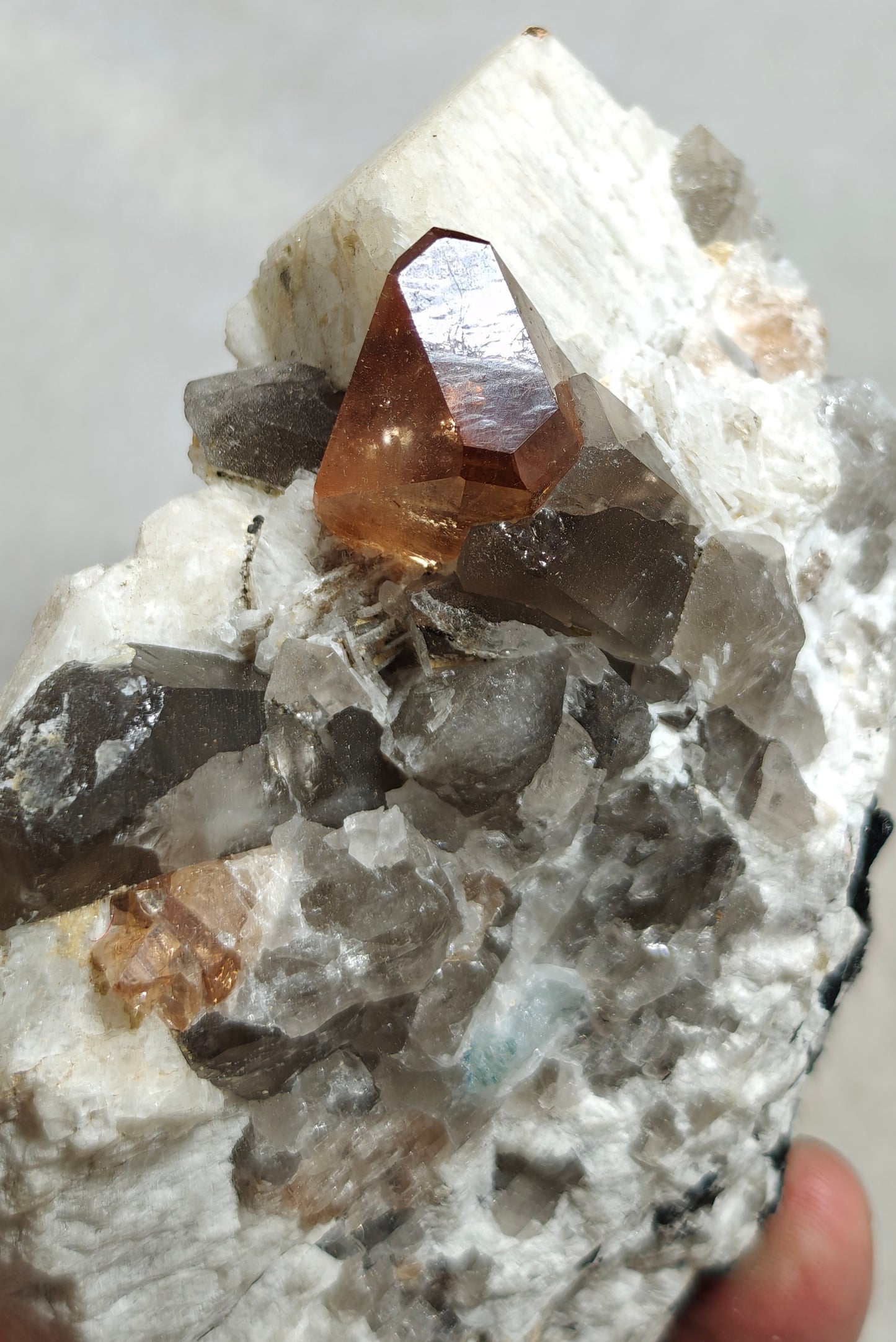 Terminated peach color Topaz crystal on matrix 576 grams