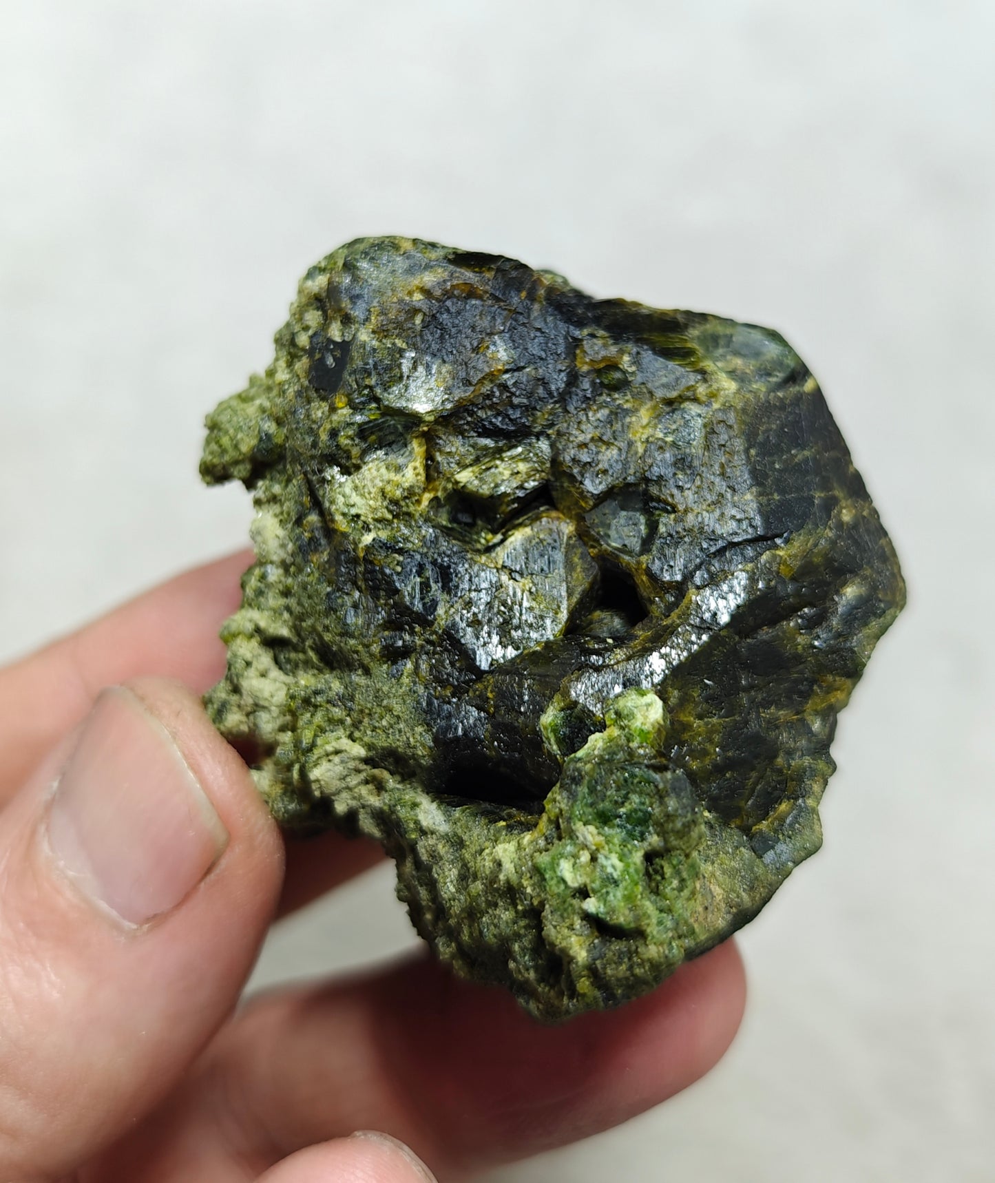Natural green garnet variety demantoid crystal 142 grams