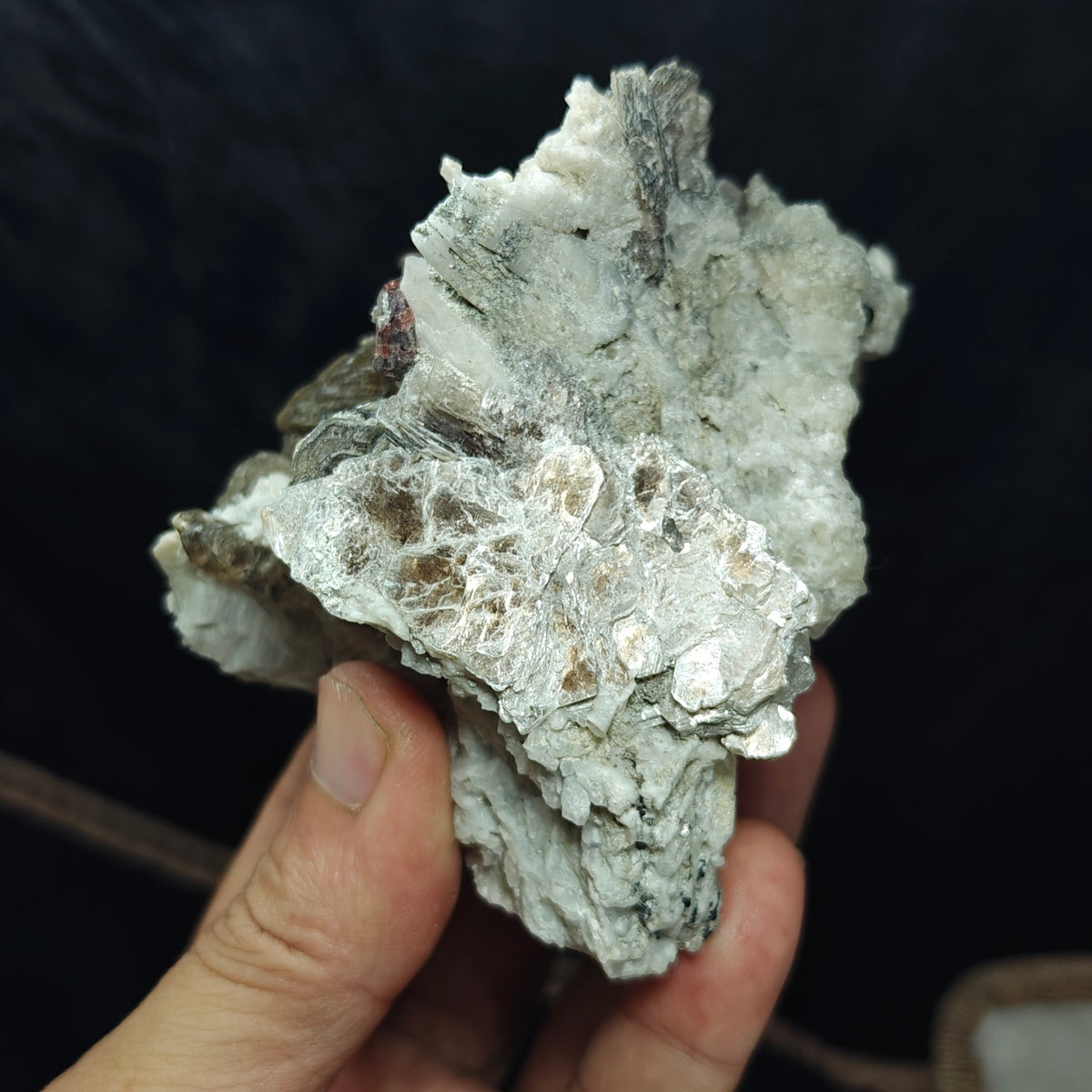 Natural spessartine garnet embedded in muscovite, with albite and quartz 544 grams