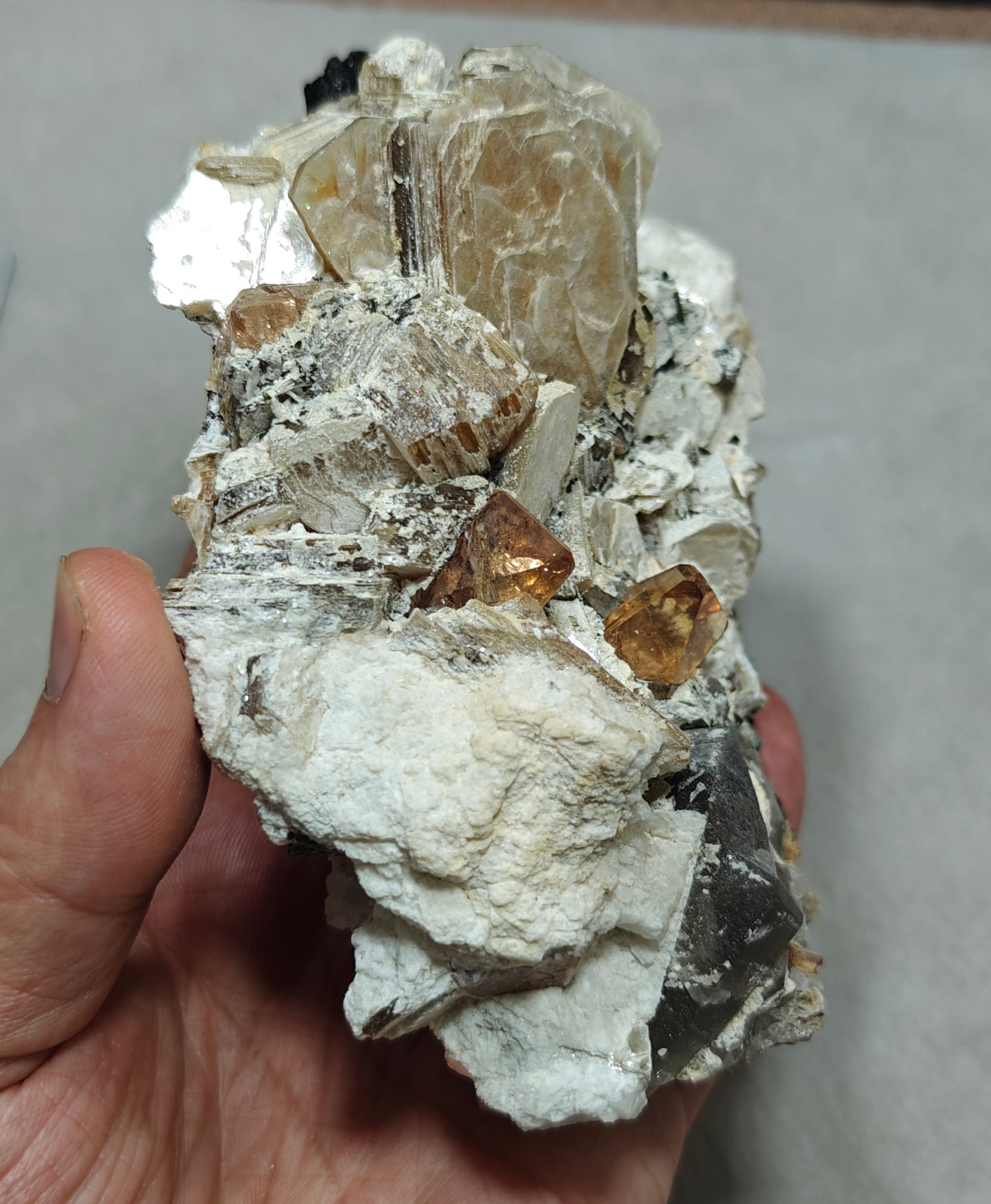 peach color Topaz crystals on matrix 686 grams