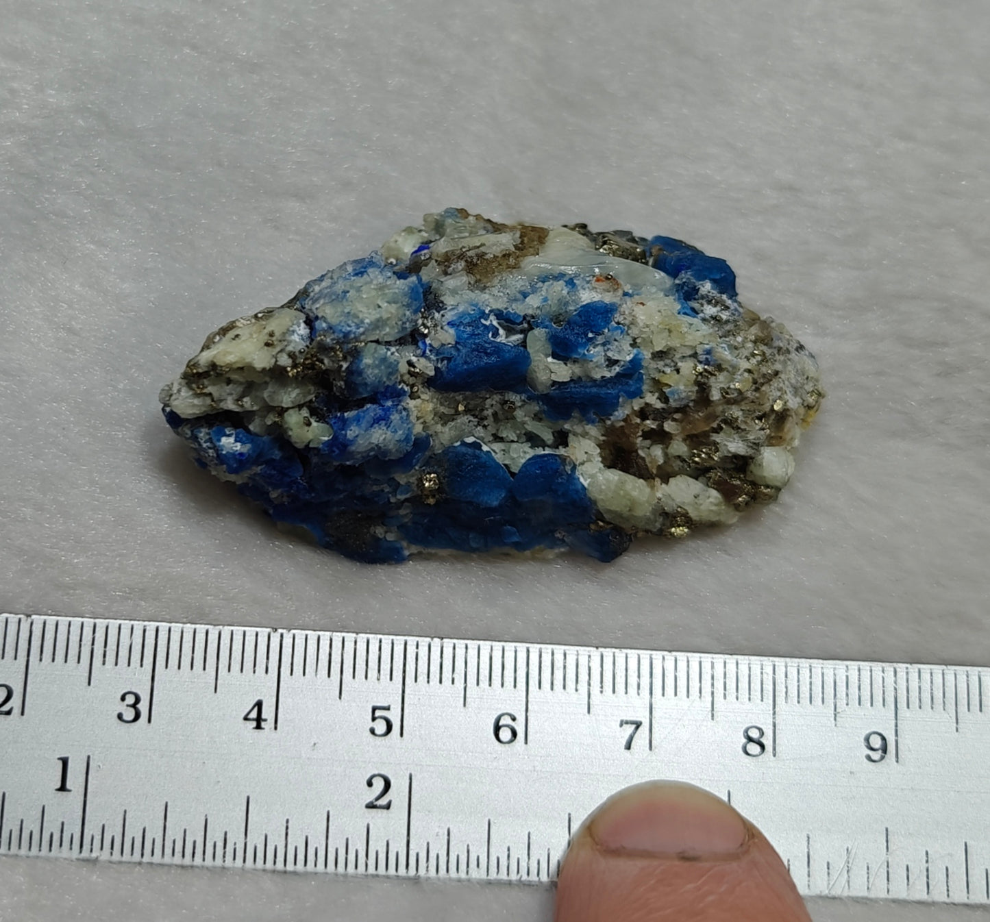 Afghanite Fluorescent in matrix with some pyrite and phlogopite 41 grams