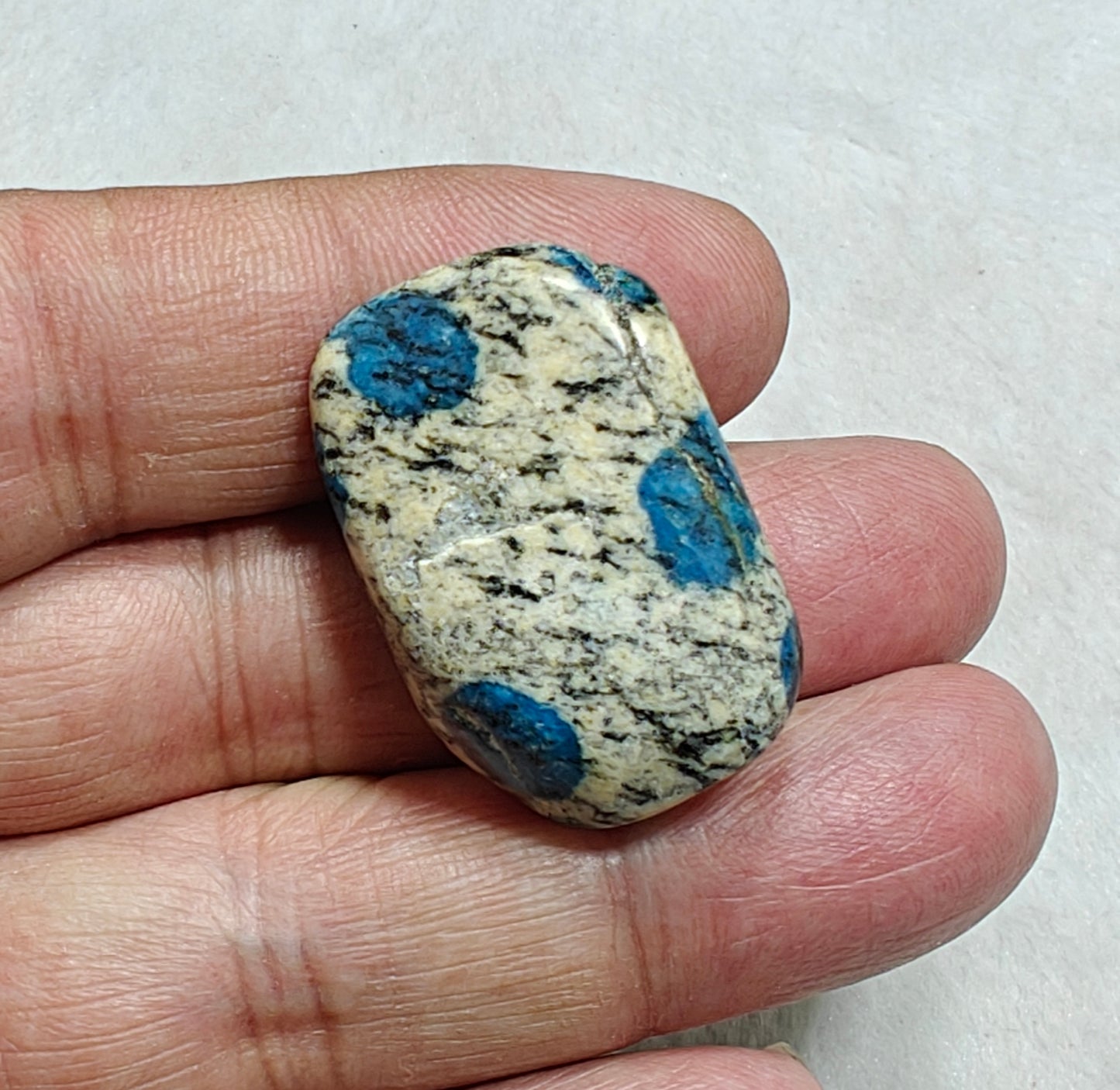 3 Natural K2 stone tumbles also known as Azurite in granite