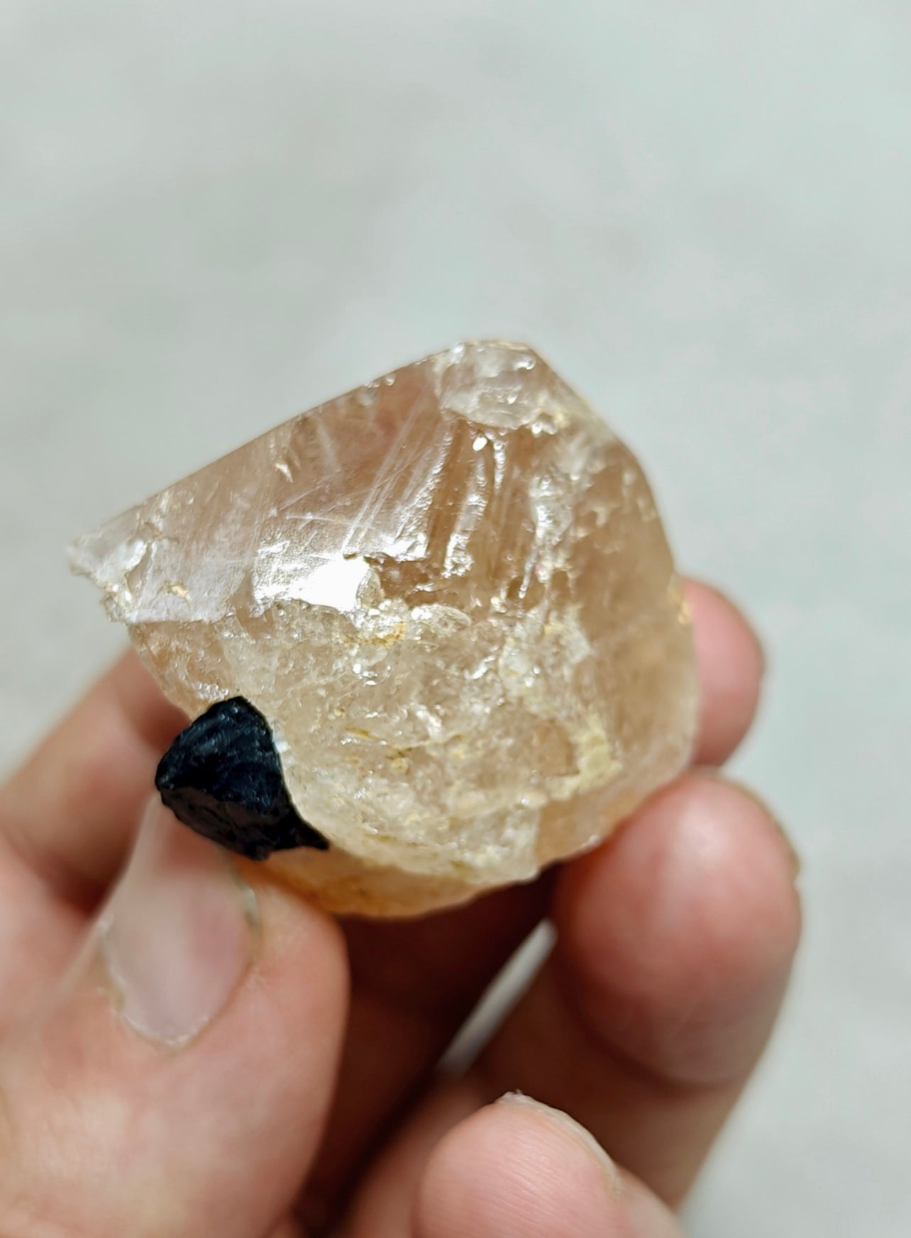 Peach color Topaz crystal with Tourmaline 68 grams