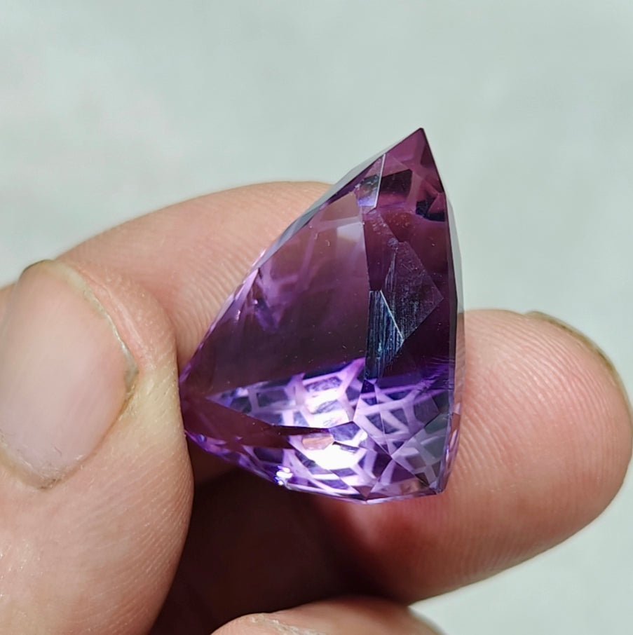 An amazing trillion fancy cut faceted amethyst gemstone 46 carats