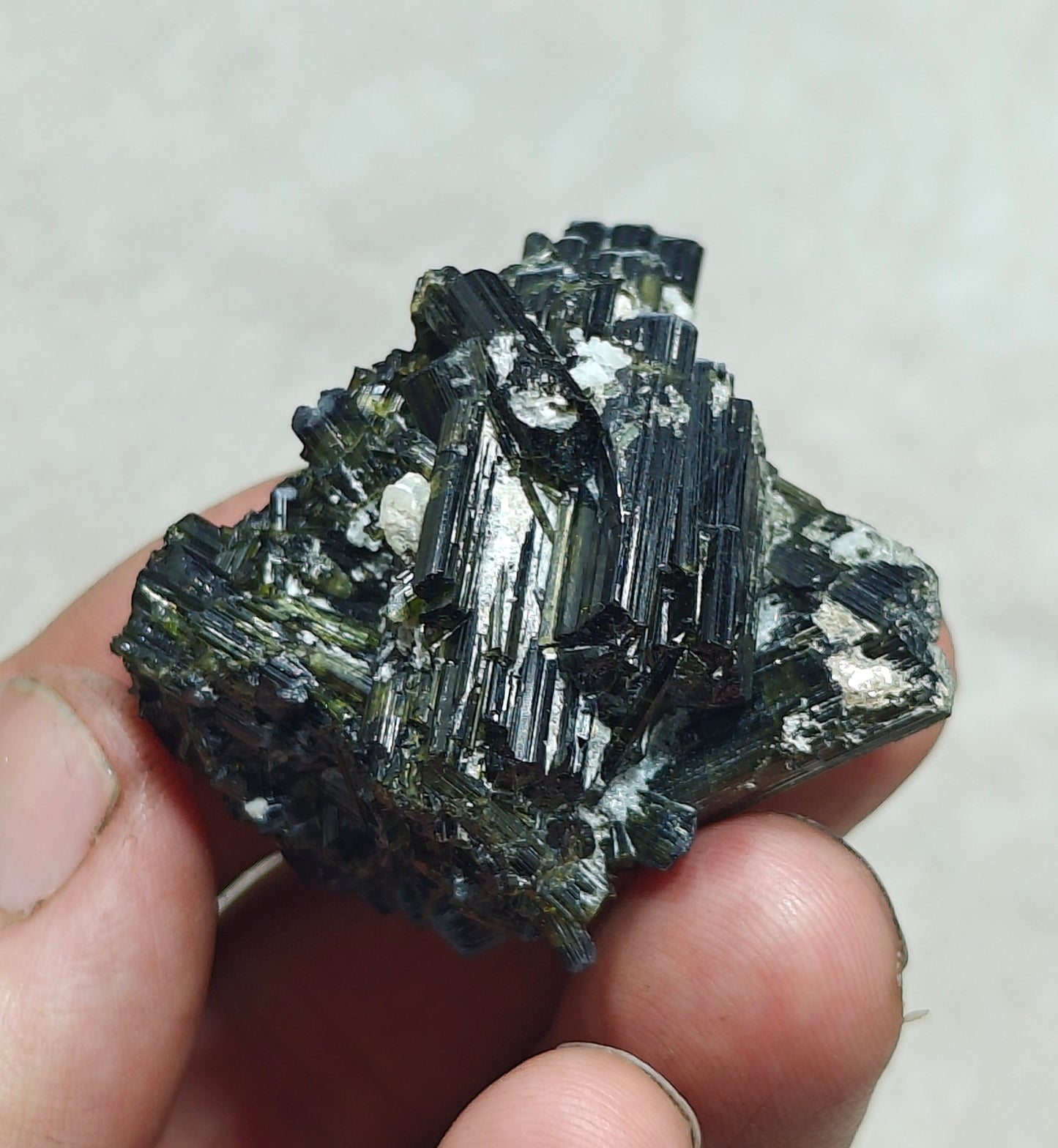 Dark green color Tourmaline crystal with chatoyance effect 50 grams