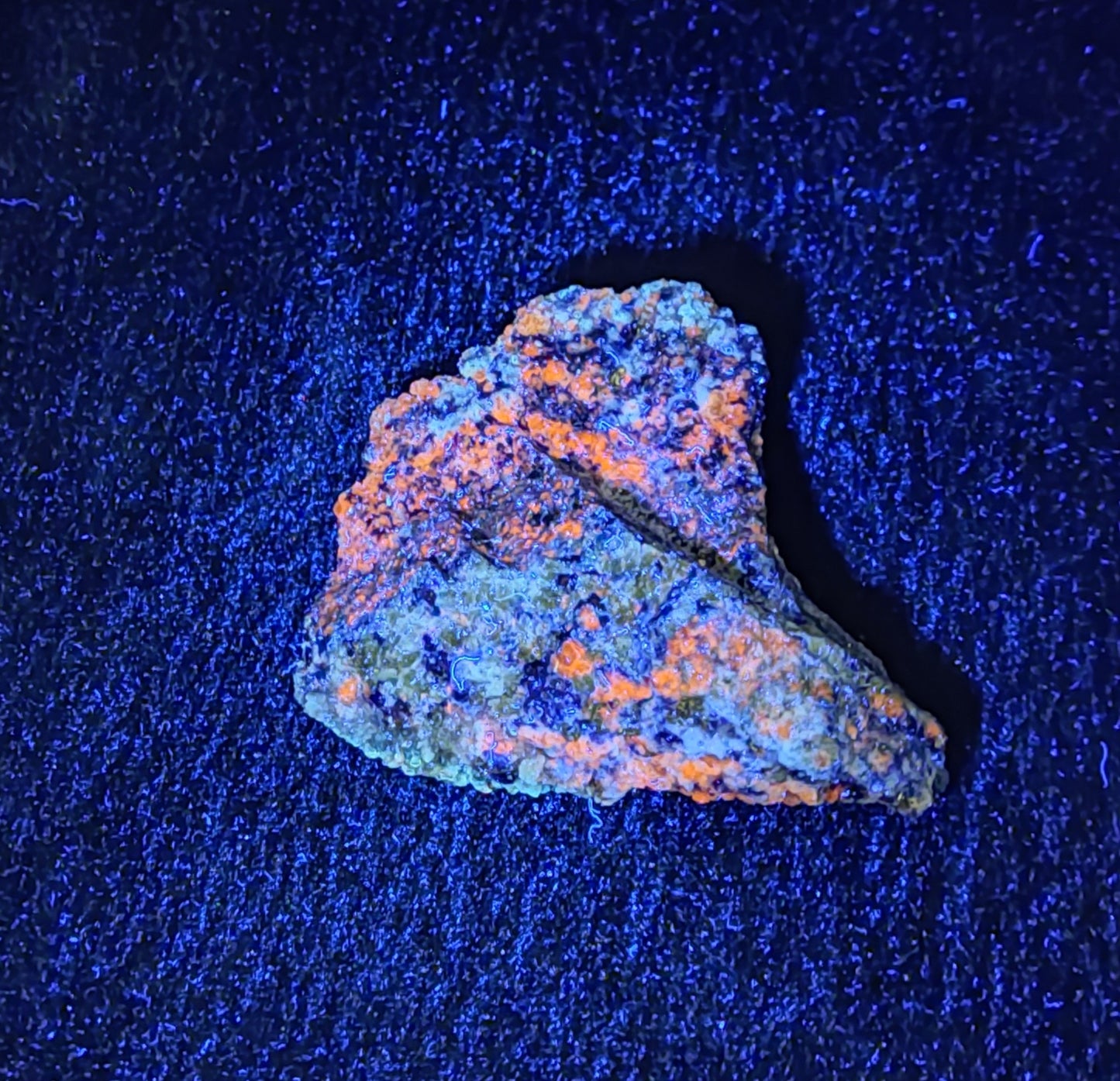 Partly Fluorescent lazurite with Pyrite 73 grams