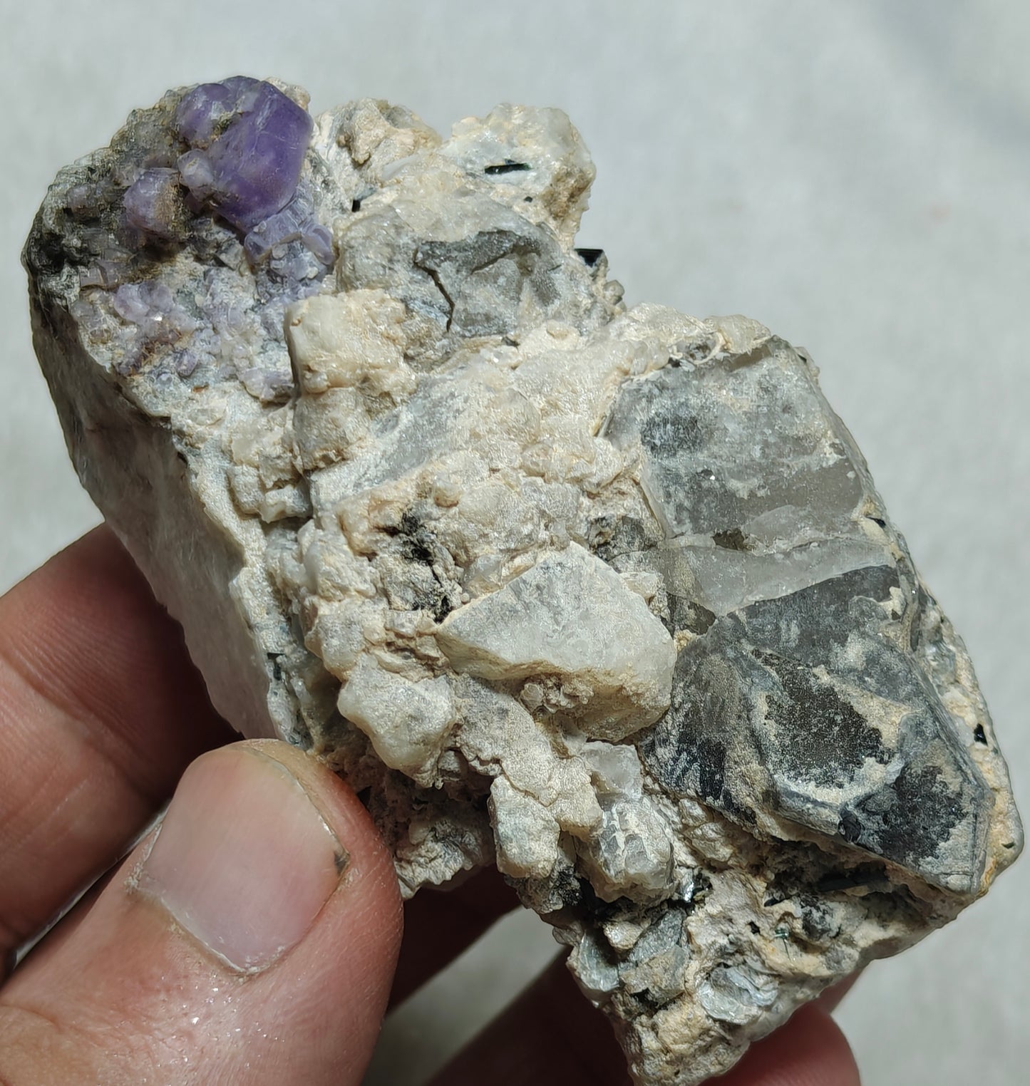 An amazing specimen of purple Apatite crystals on matrix 120 grams