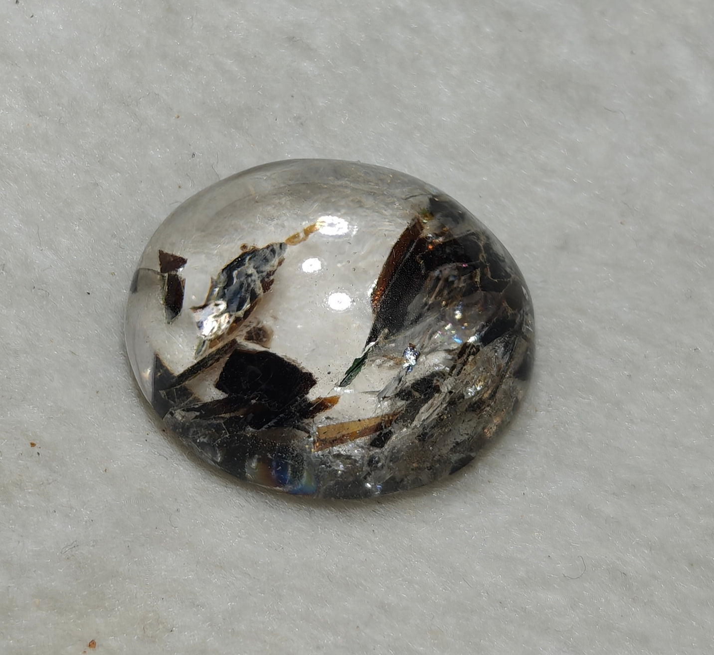 Mica included Quartz cabochon 79 carats