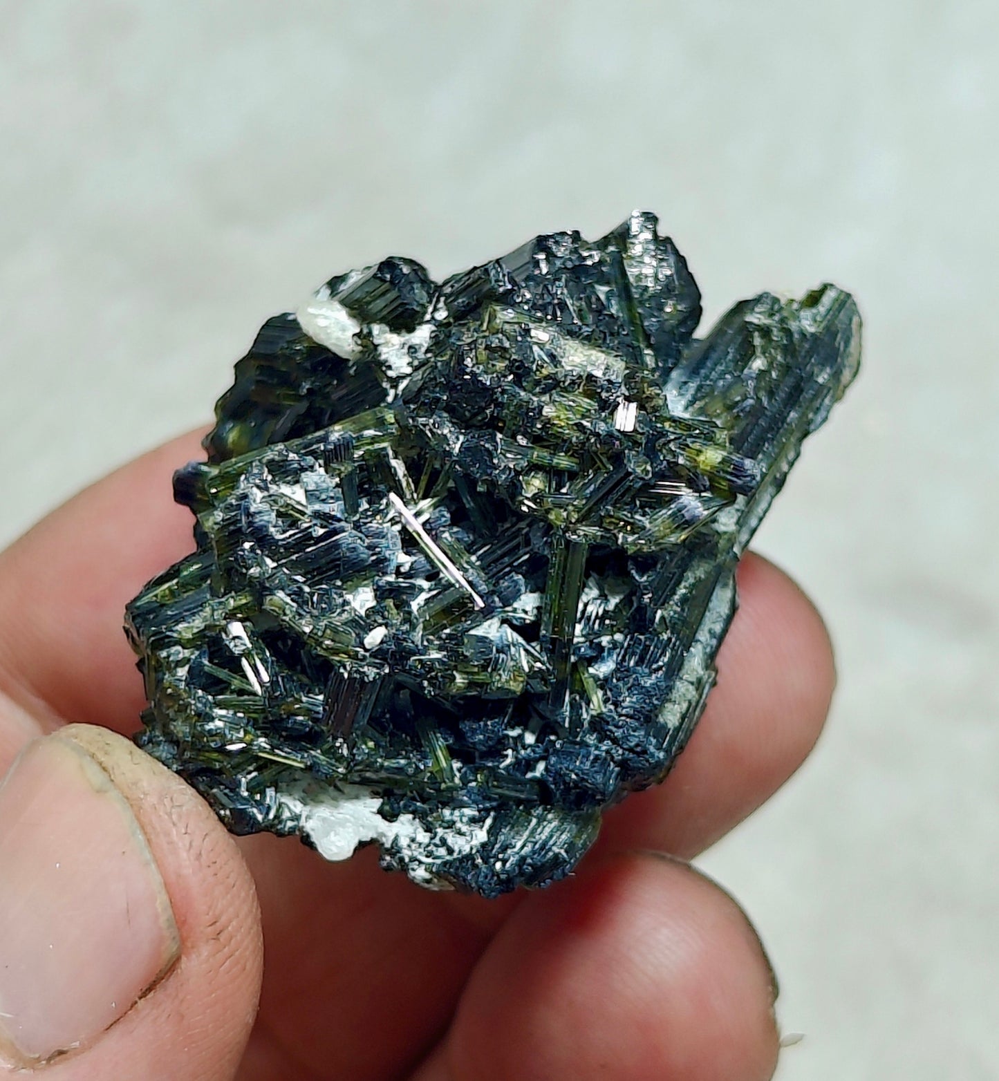Dark green color Tourmaline crystal with chatoyance effect 50 grams