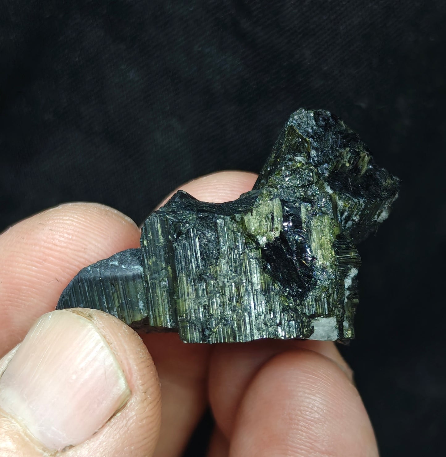 Dark green color Tourmaline with chatoyance effect 19 grams