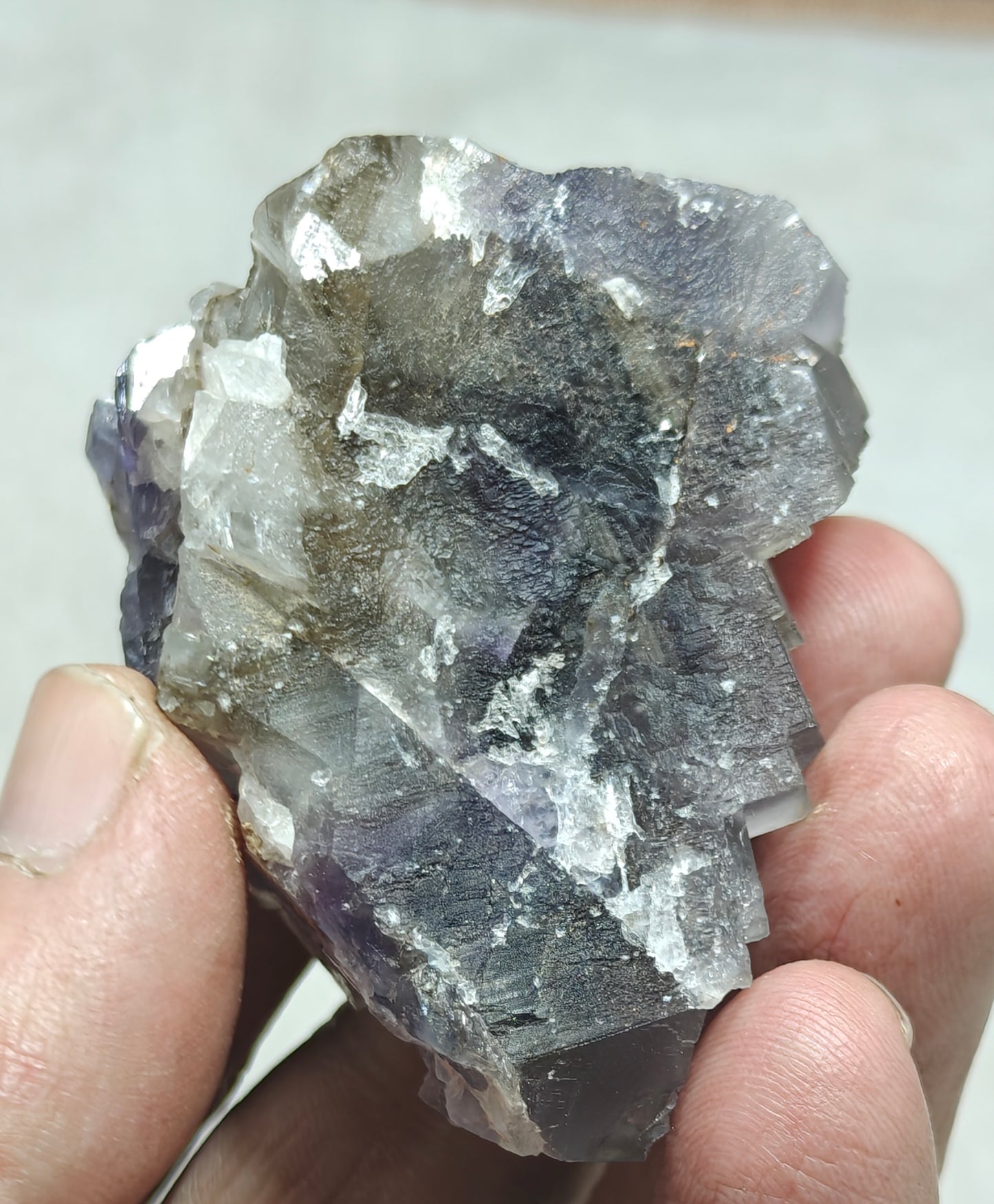 An amazing Single beautiful specimen of grey/purple fluorite with calcite crystals 150 grams