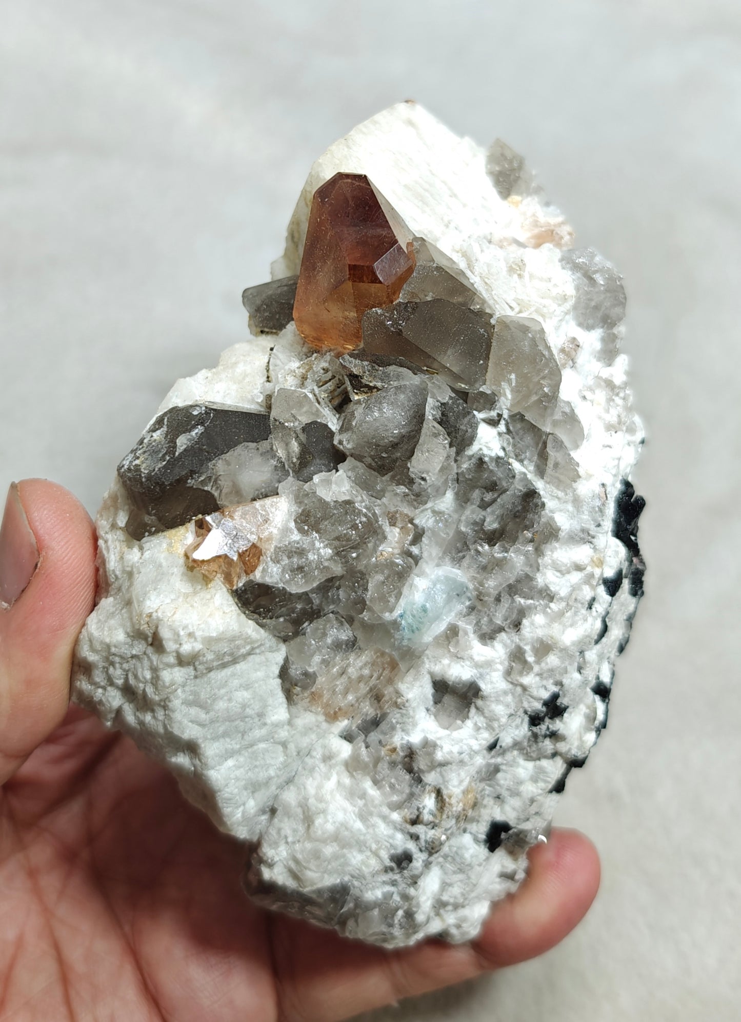Terminated peach color Topaz crystal on matrix 576 grams