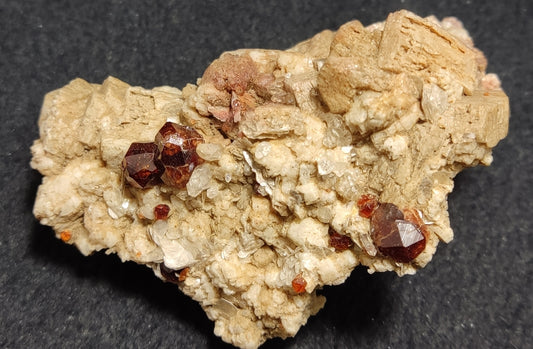 Spessartine Garnets cluster on matrix with Muscovite and albite 64 grams