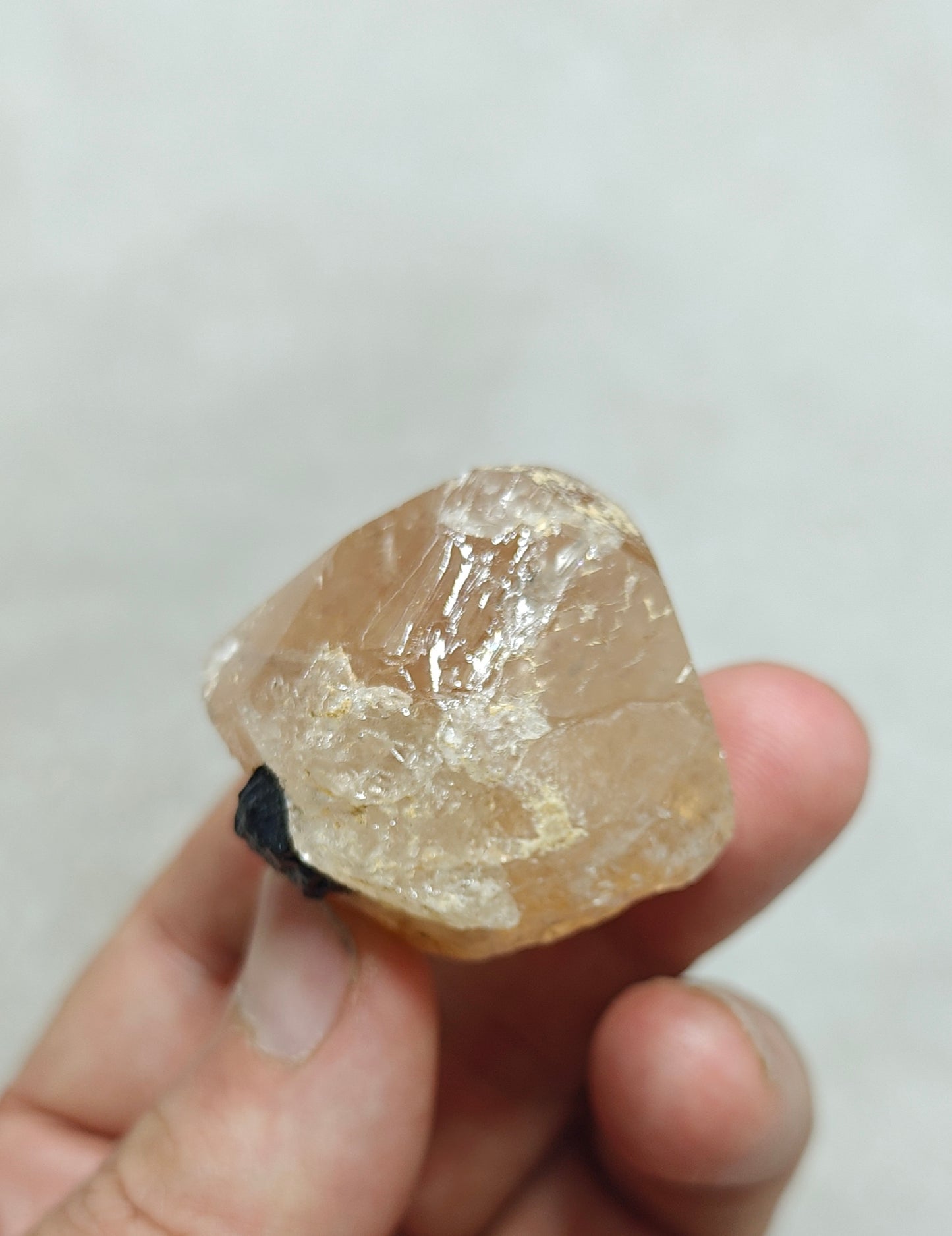 Peach color Topaz crystal with Tourmaline 68 grams