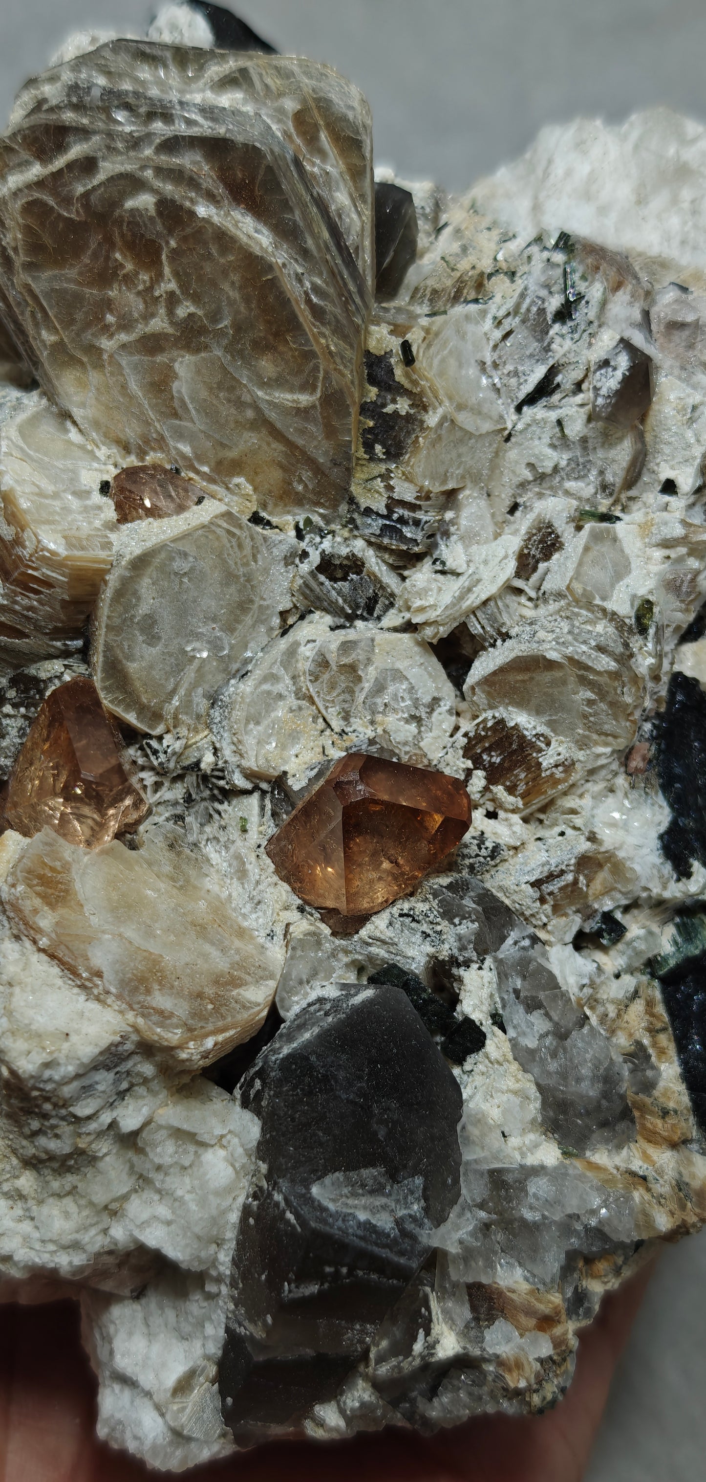 peach color Topaz crystals on matrix 686 grams