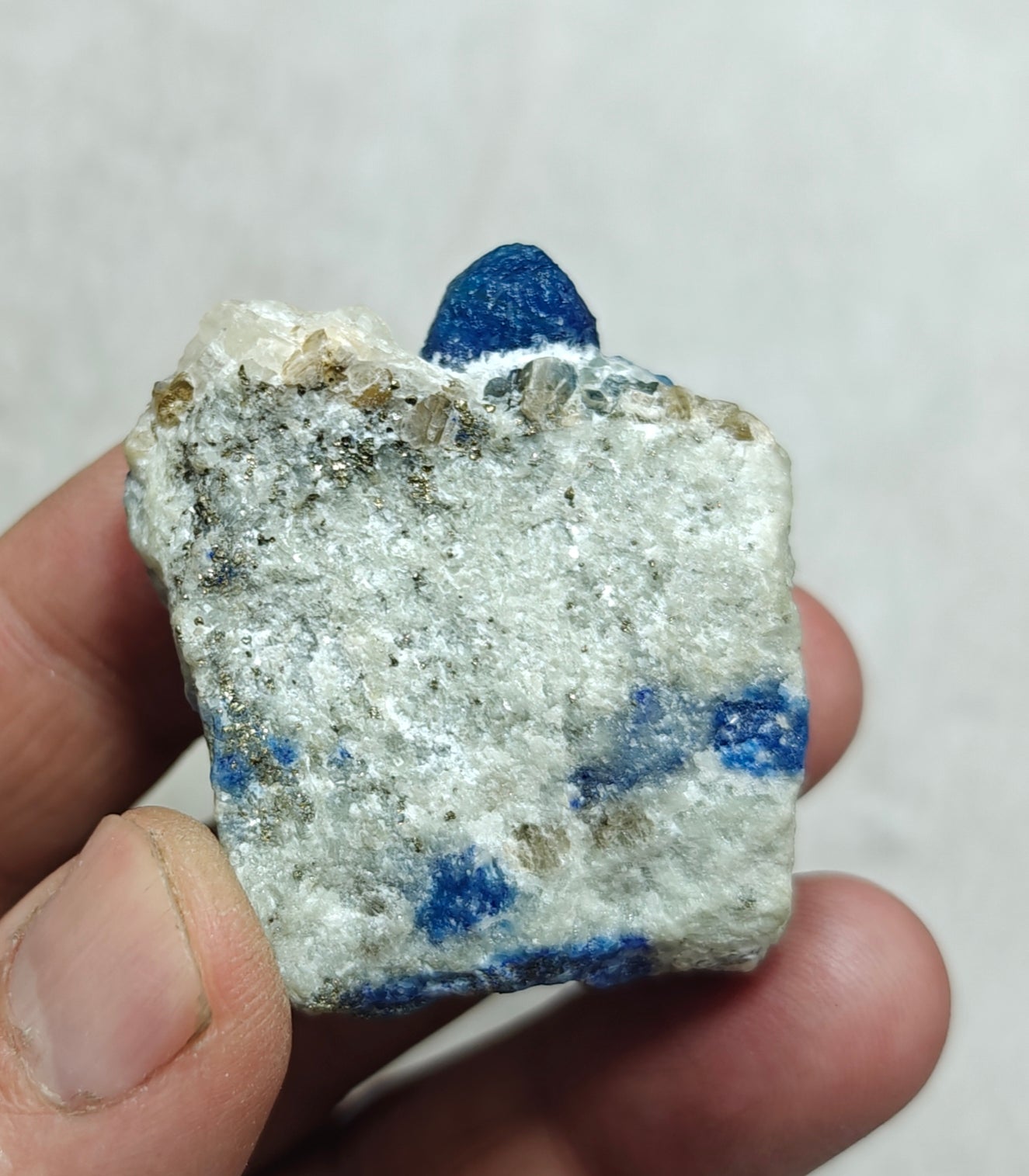 Fluorescent Afghanite/lazurite on matrix with pyrite 58 grams