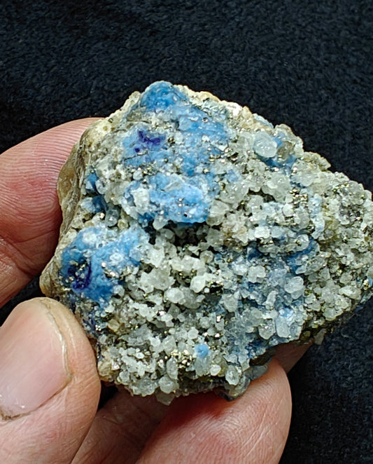 Afghanite Fluorescent in matrix with some pyrite calcite 88 grams