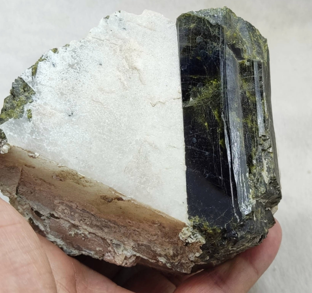 An amazing high lusterous Epidote crystal on matrix with Albite 943 cluster grams