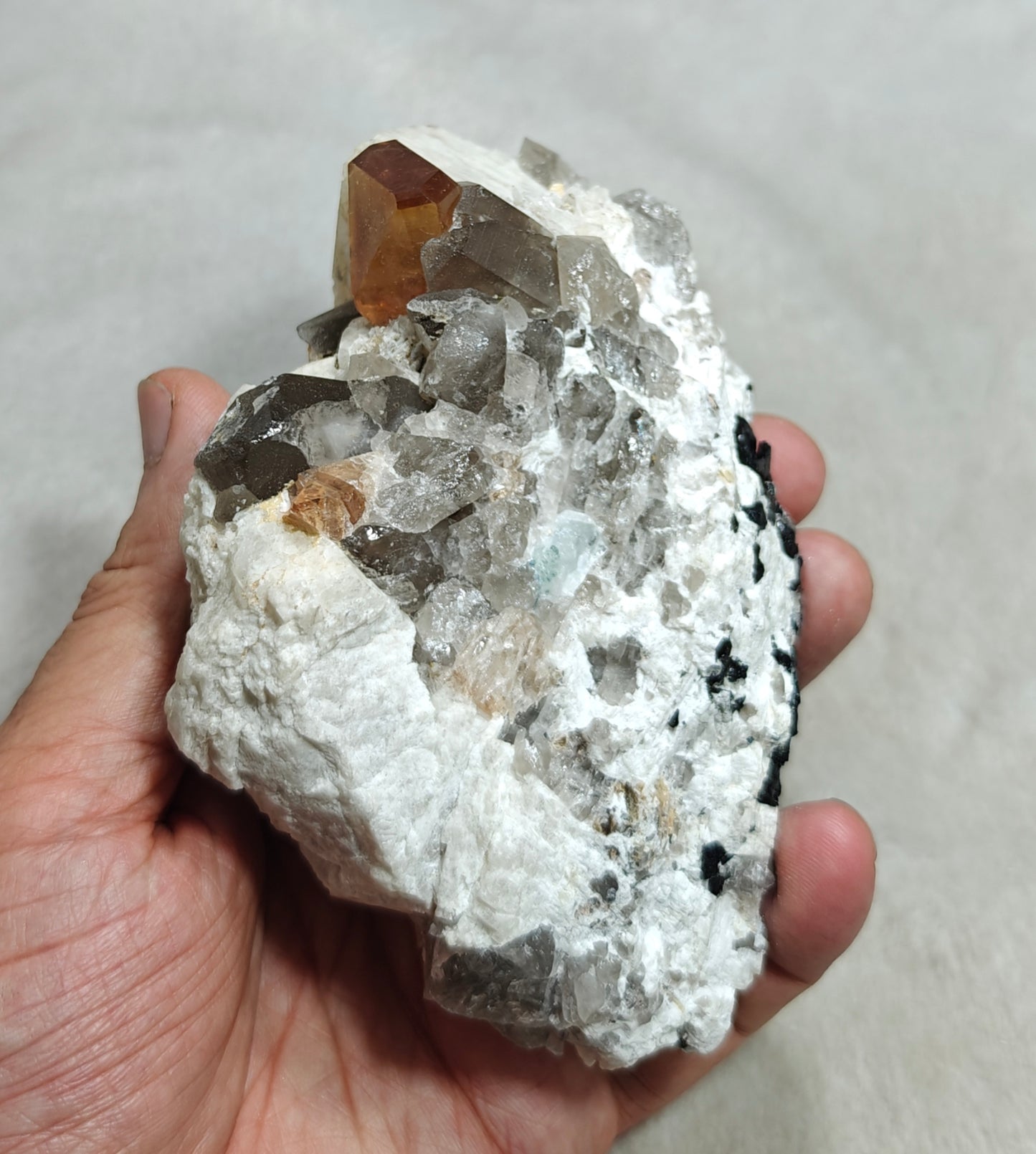Terminated peach color Topaz crystal on matrix 576 grams