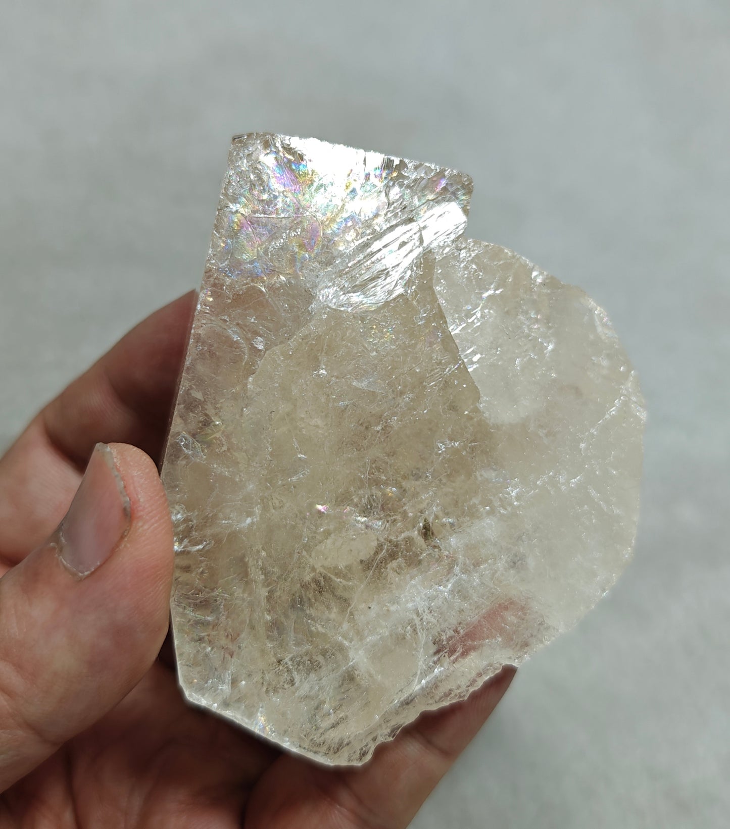 Natural light peach color Topaz crystal with rainbow effects with associated tourmaline 200 grams