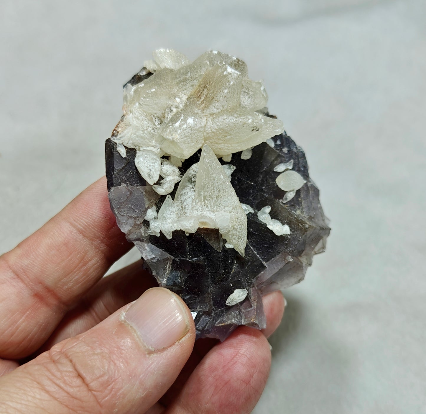 An amazing Single beautiful specimen of grey fluorite with calcite crystals 165 grams
