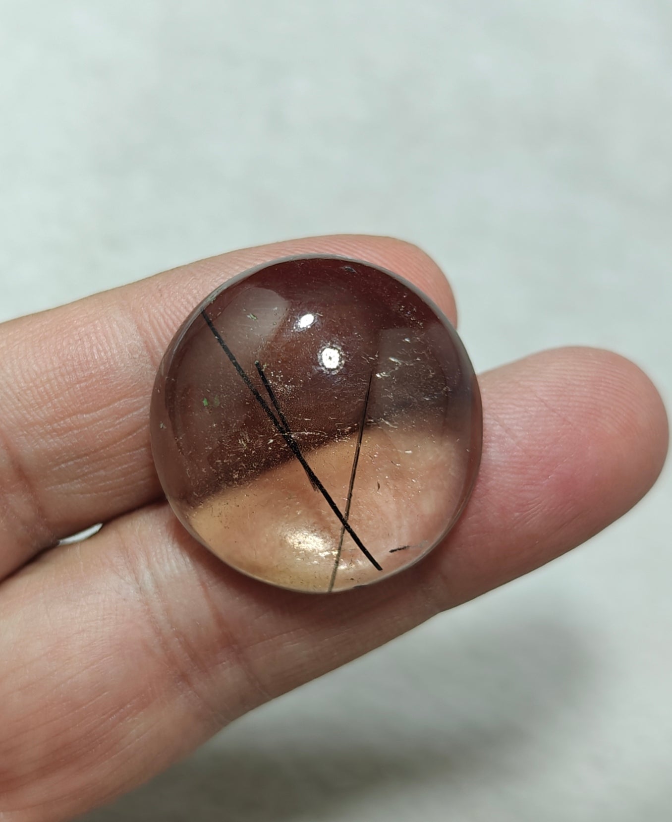 Tourmaline included smoky Quartz cabochon 64 carats