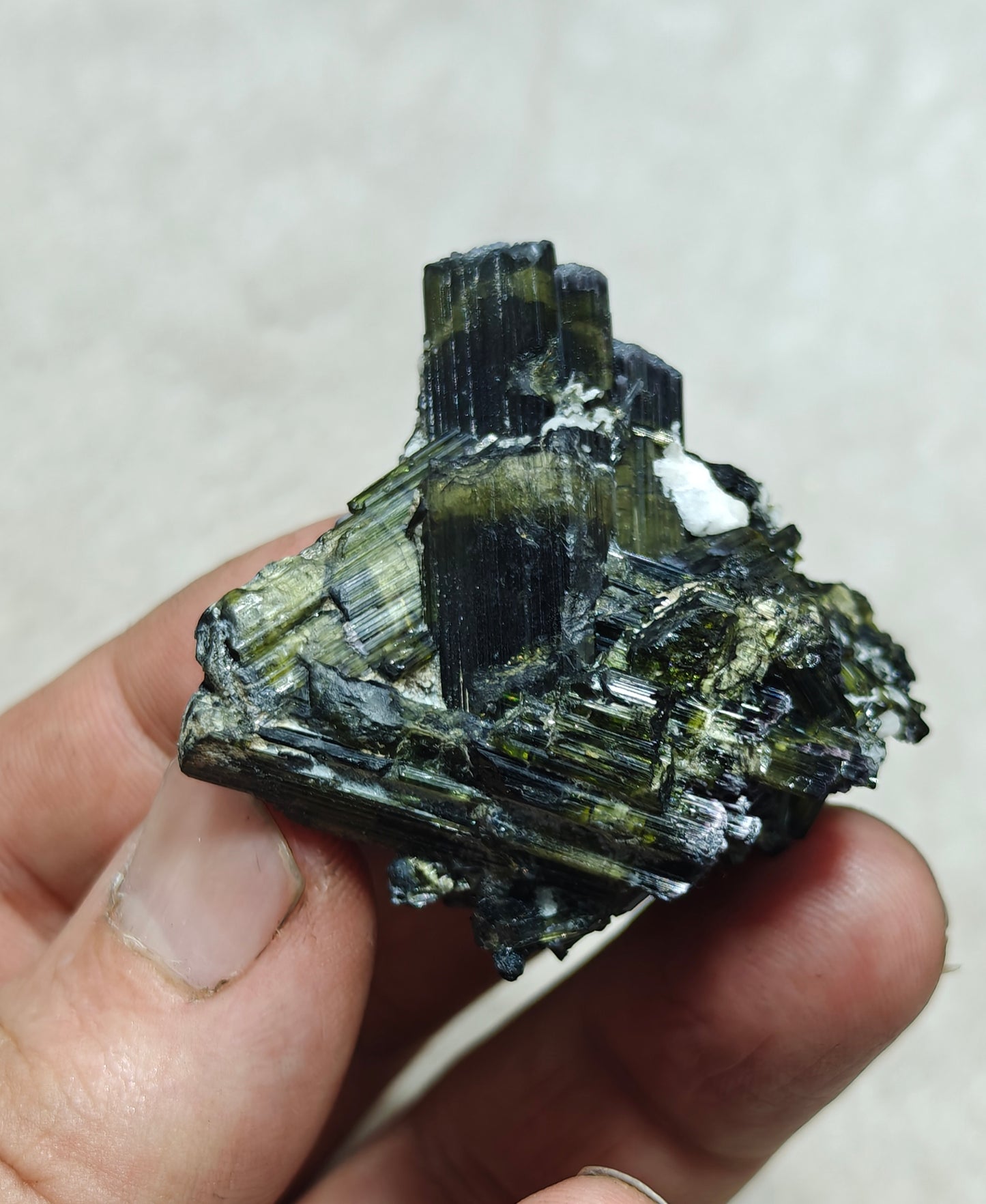 Dark green color Tourmaline crystal with chatoyance effect 50 grams
