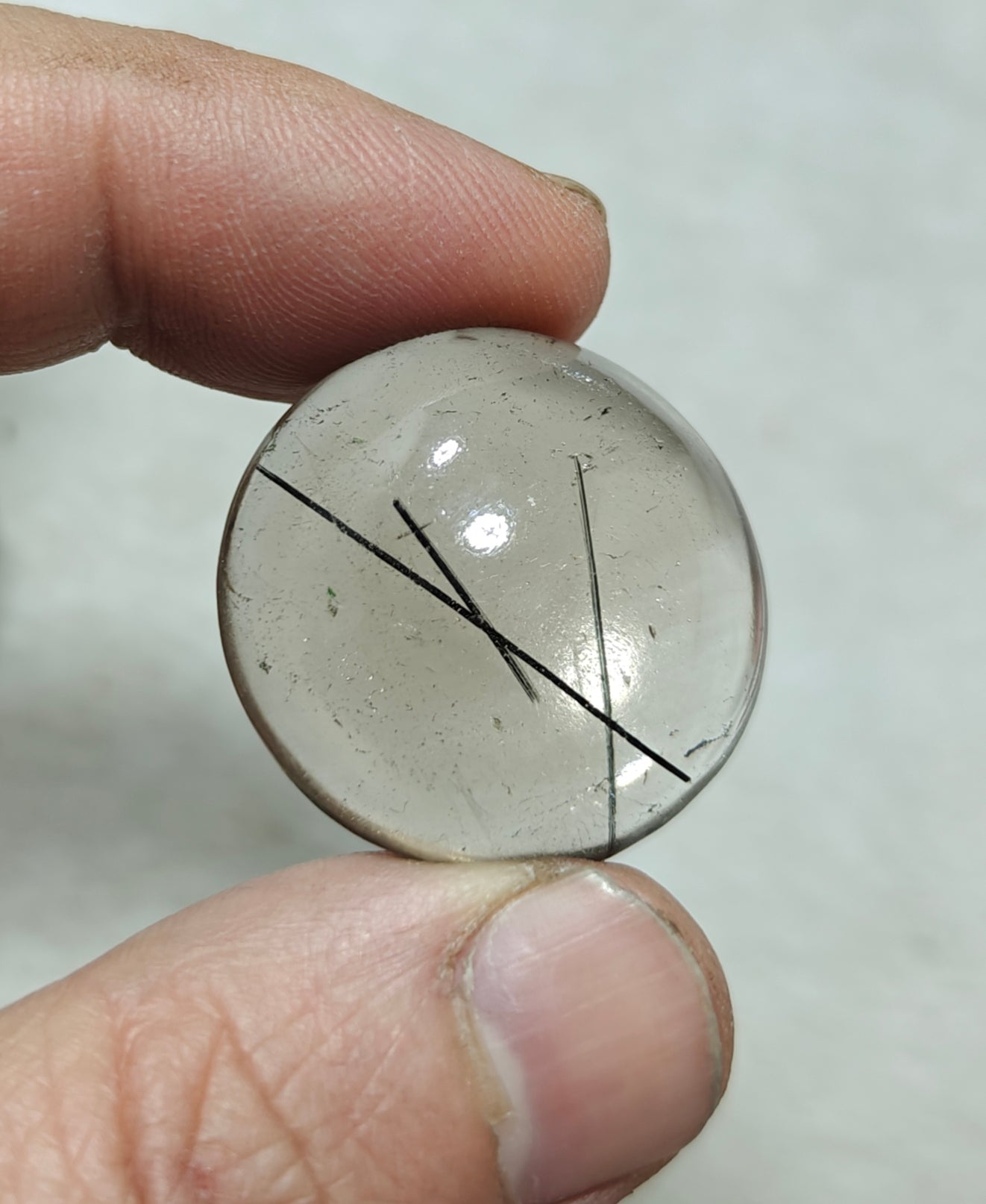 Tourmaline included smoky Quartz cabochon 64 carats