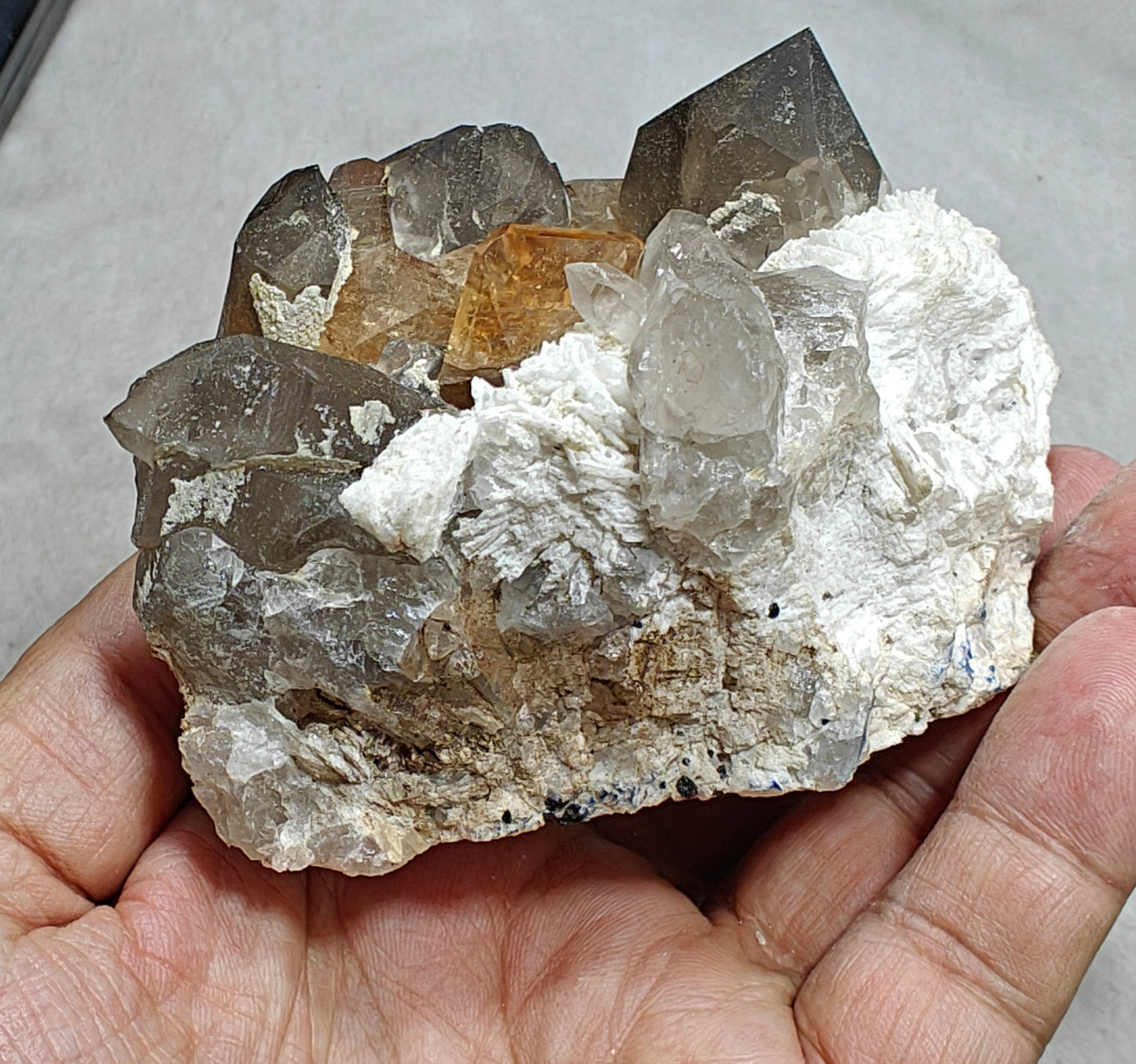 Natural peach color Topaz crystals on matrix with smoky quartz 455 grams