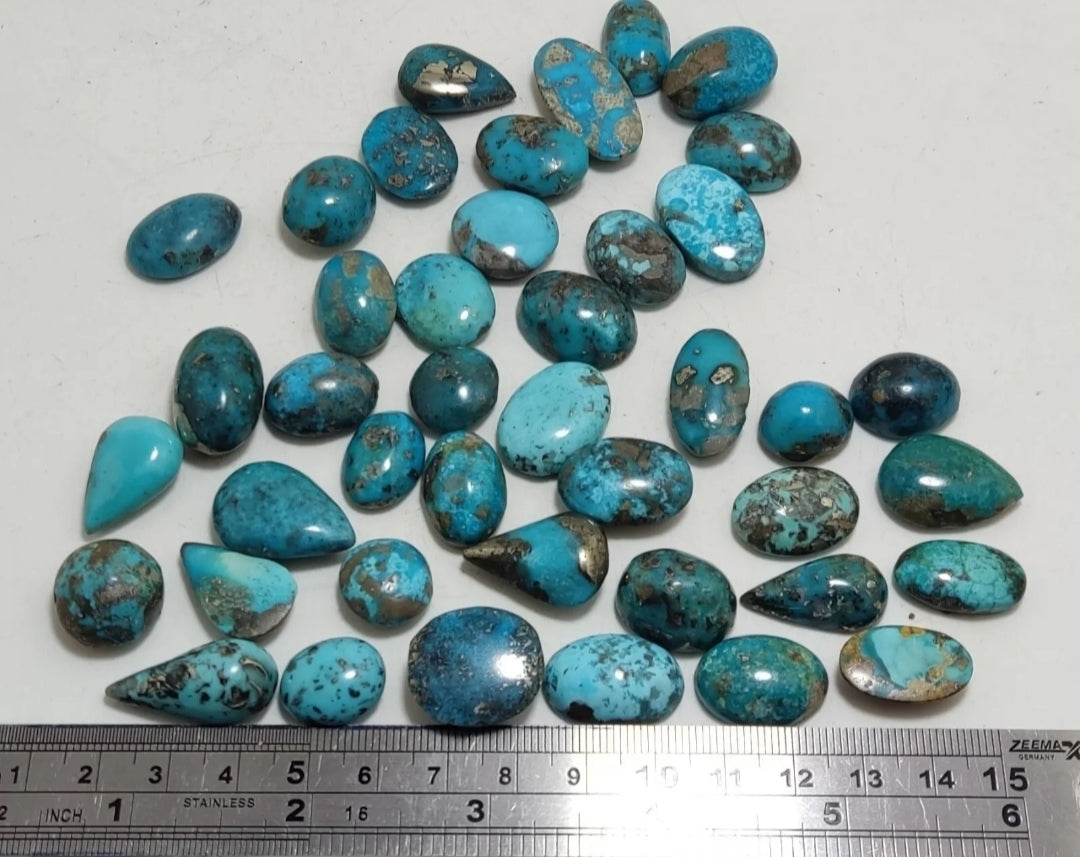 An amazing lot of turquoise cabochons 138 grams