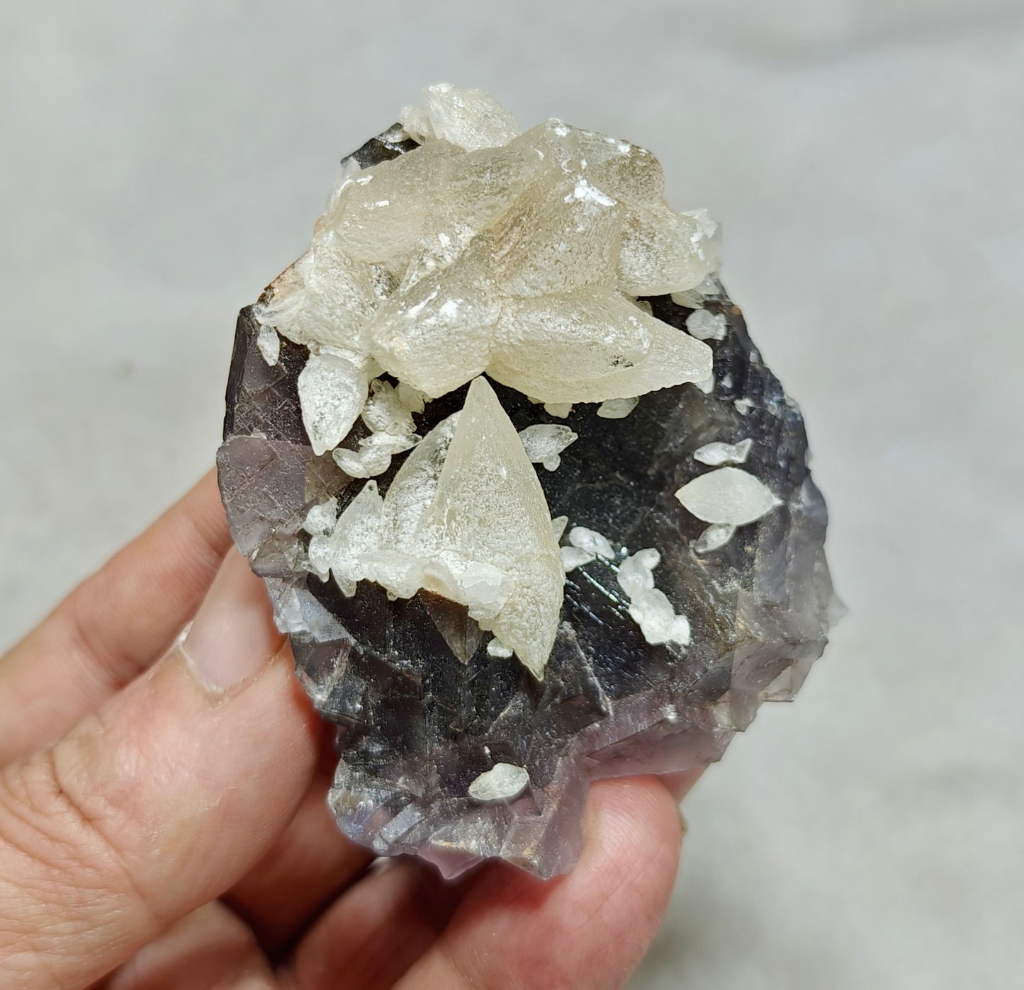 An amazing Single beautiful specimen of grey fluorite with calcite crystals 165 grams