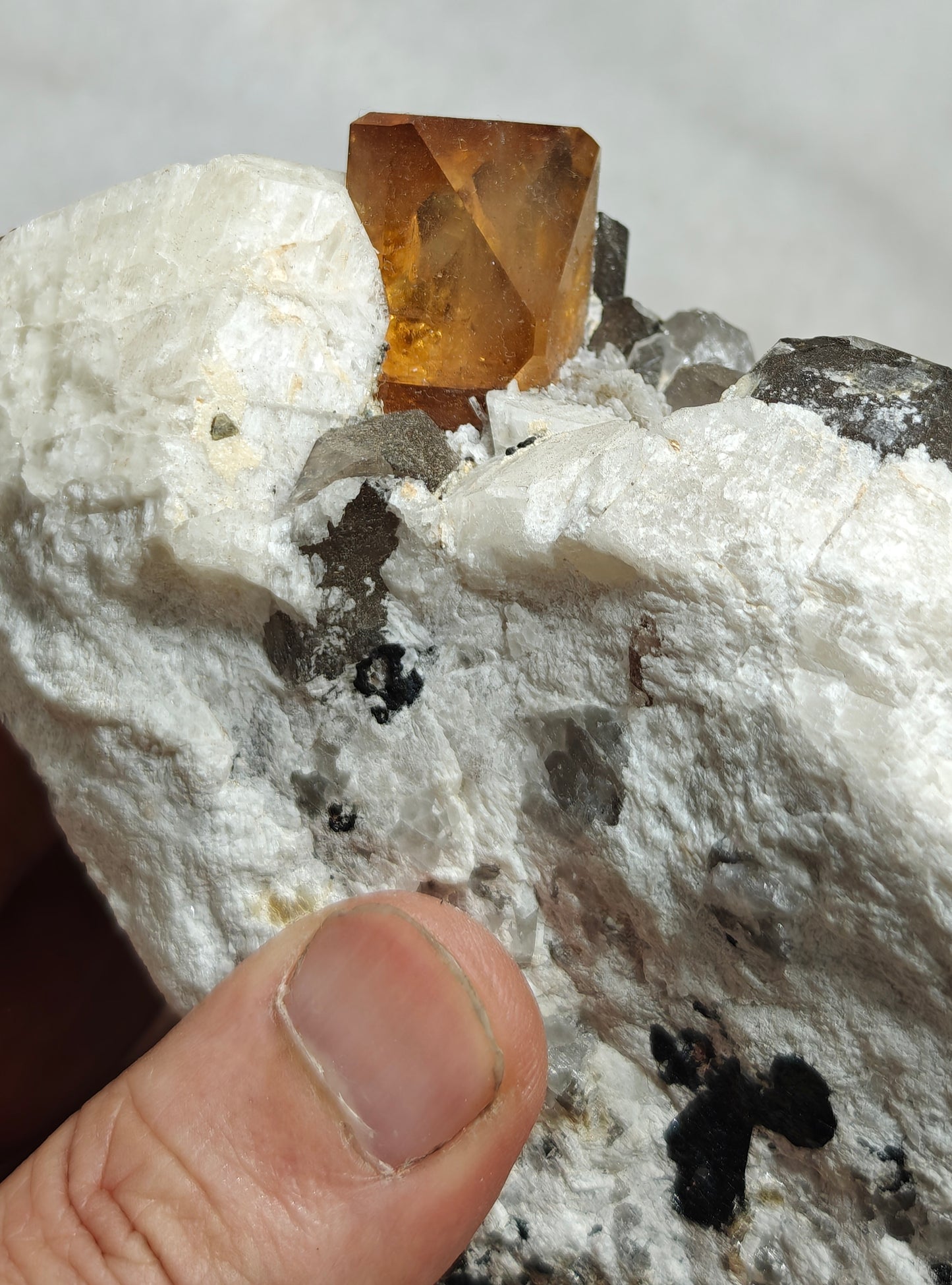 Terminated peach color Topaz crystal on matrix 576 grams