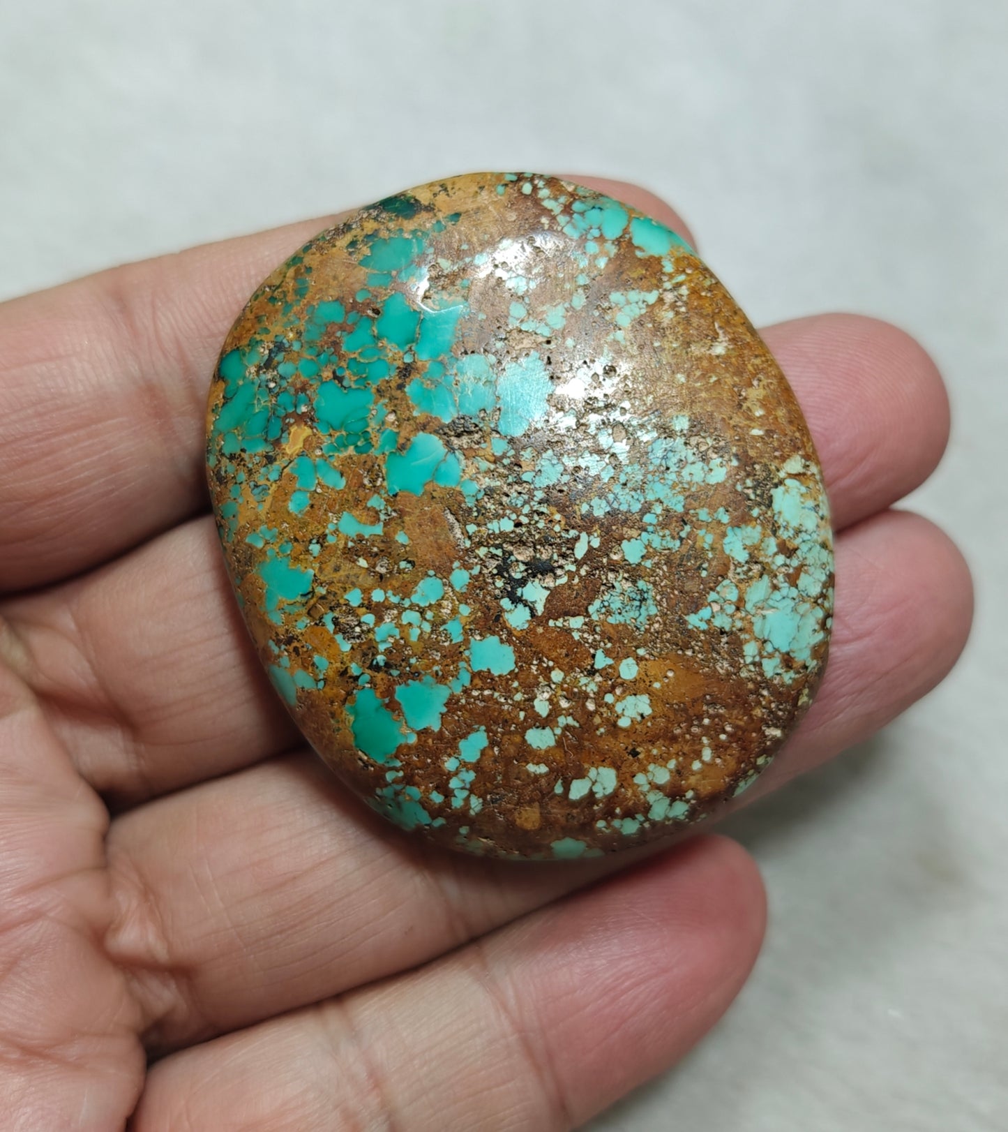 An amazing middle eastern natural turquoise Cabochon in matrix 44 grams