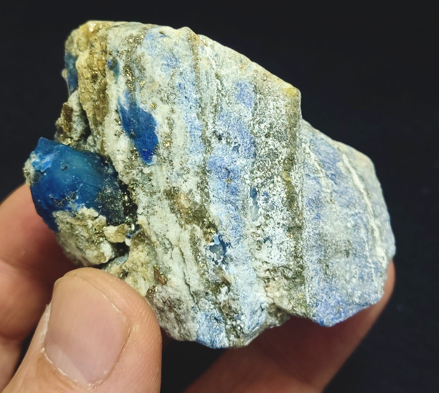 Afghanite Fluorescent in matrix with some pyrite 190 grams