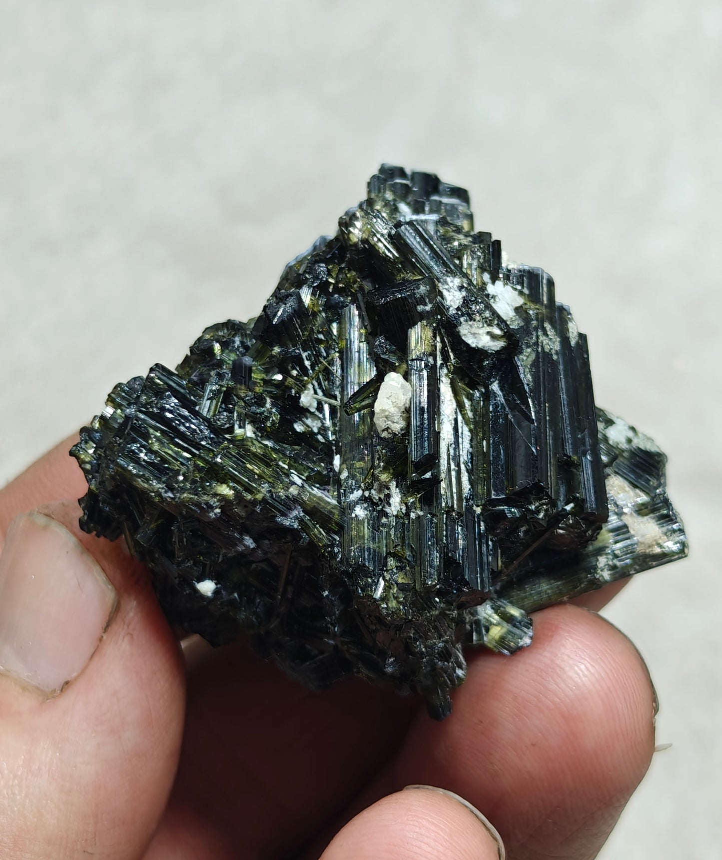 Dark green color Tourmaline crystal with chatoyance effect 50 grams