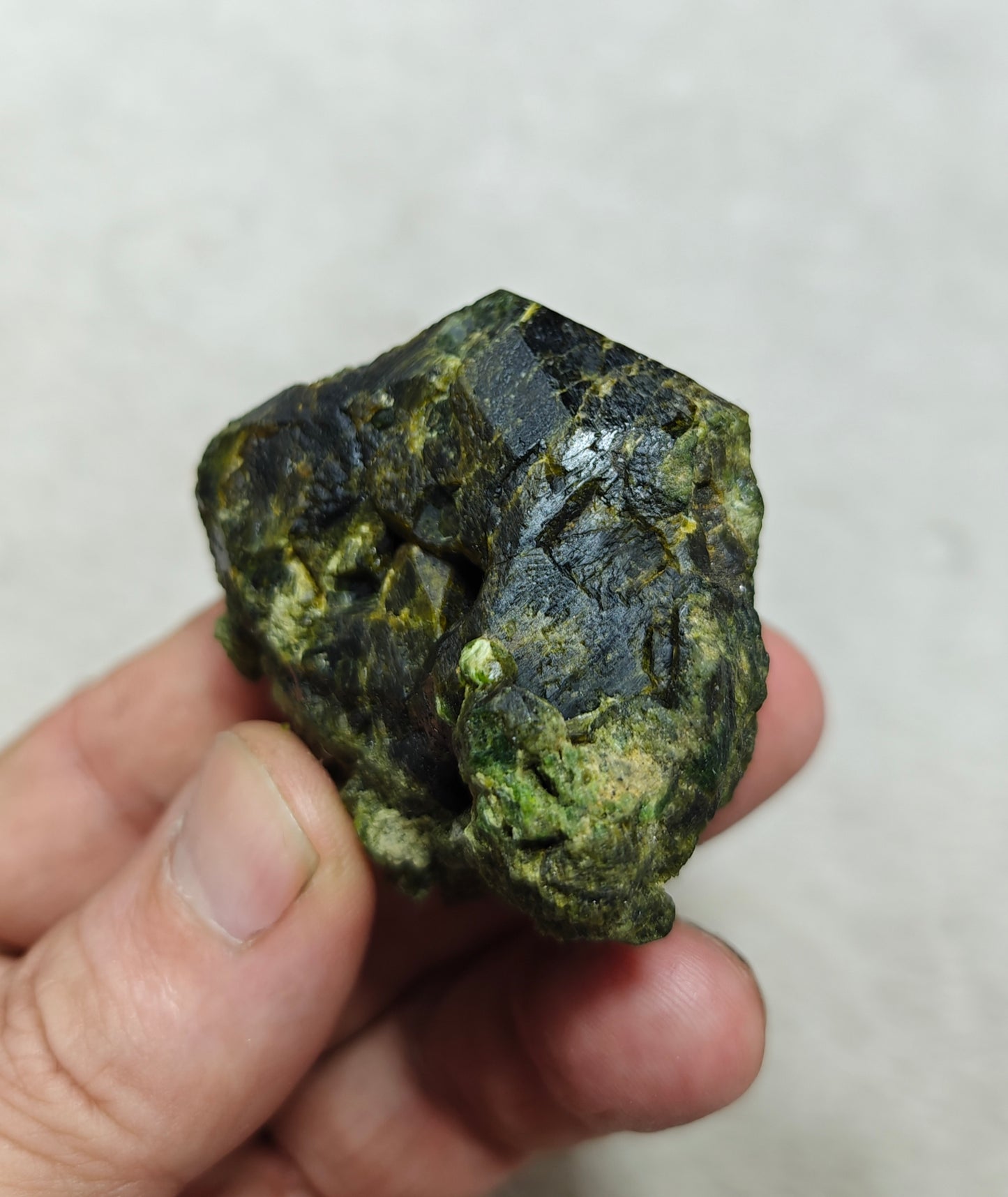 Natural green garnet variety demantoid crystal 142 grams