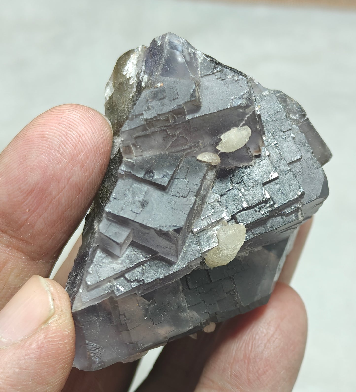 An amazing Single beautiful specimen of grey/purple fluorite with calcite crystals 150 grams