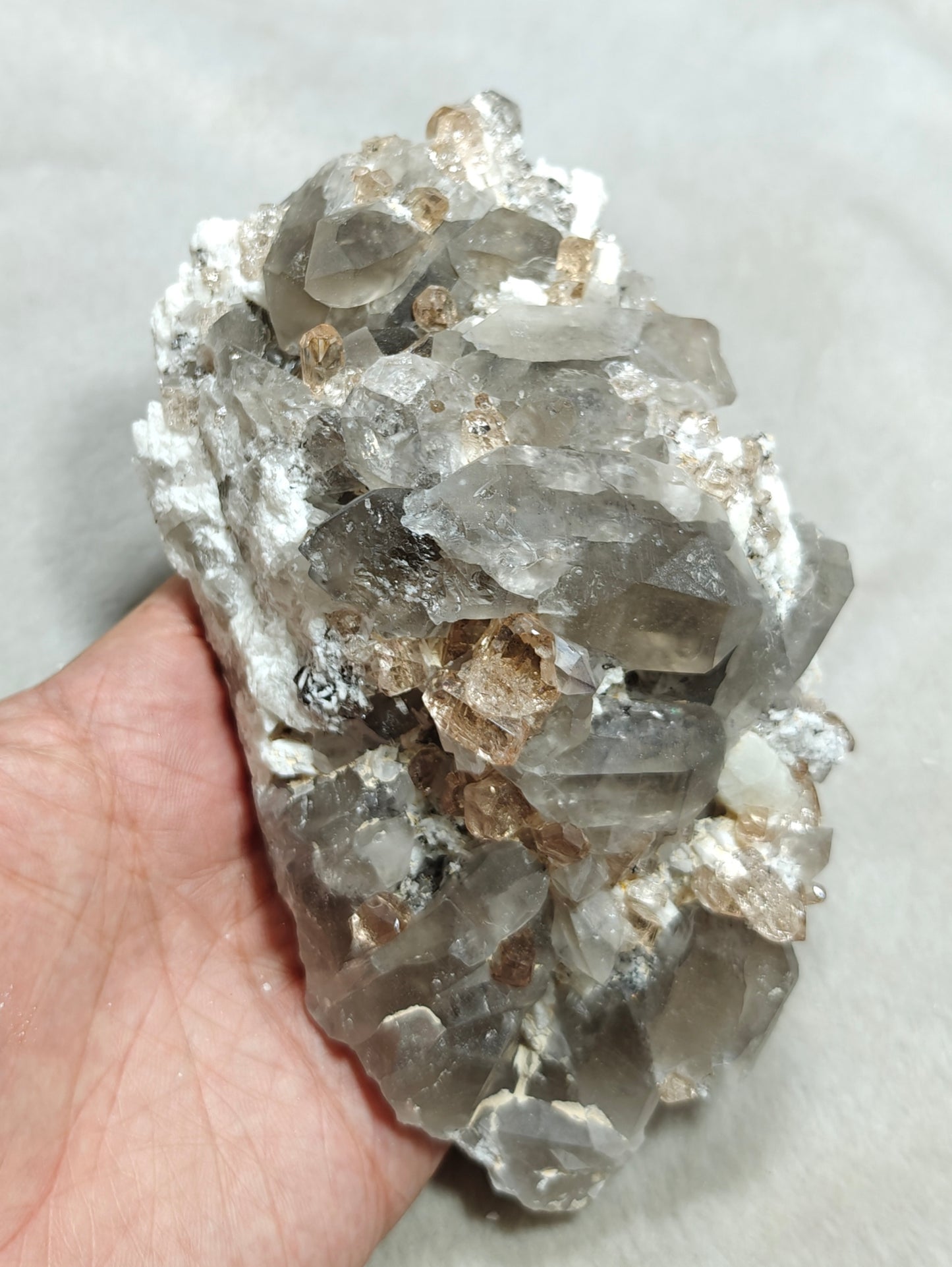 Natural terminated peach color Topaz crystals with smoky quartz on matrix 750 grams