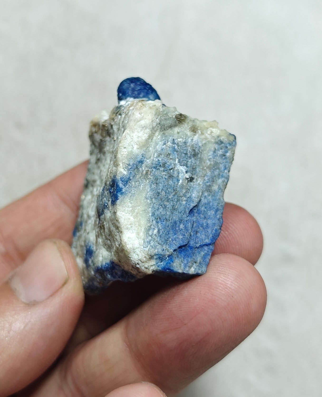 Fluorescent Afghanite/lazurite on matrix with pyrite 58 grams