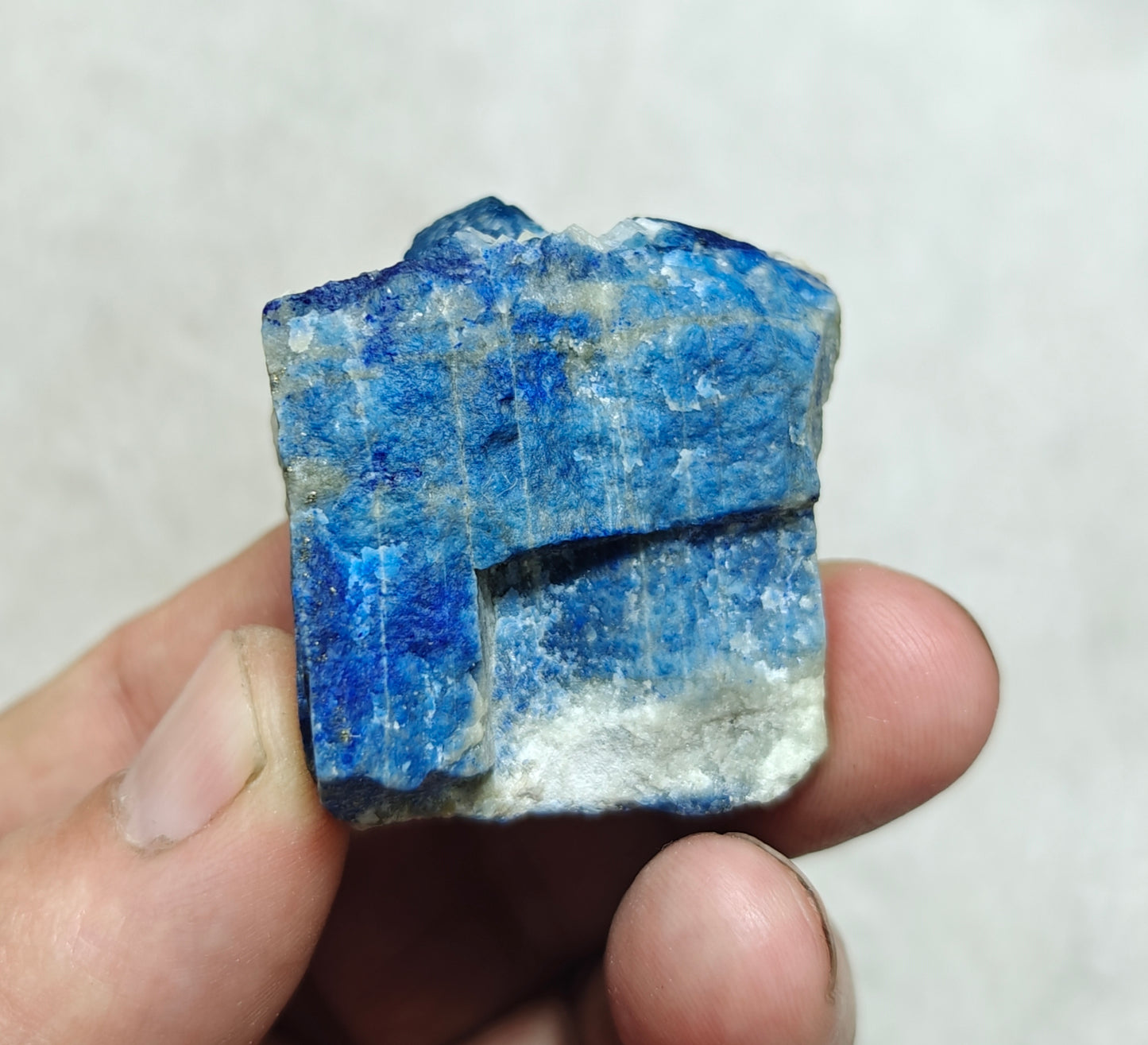 Fluorescent Afghanite/lazurite on matrix with pyrite 58 grams