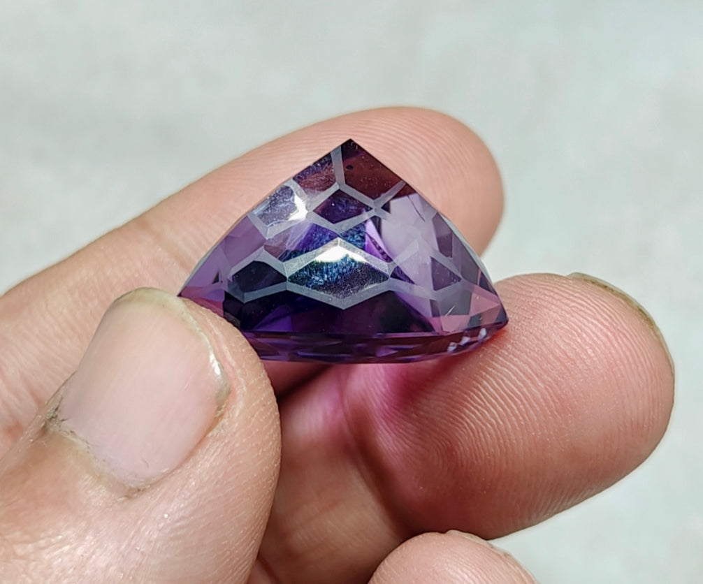 An amazing trillion fancy cut faceted amethyst gemstone 46 carats