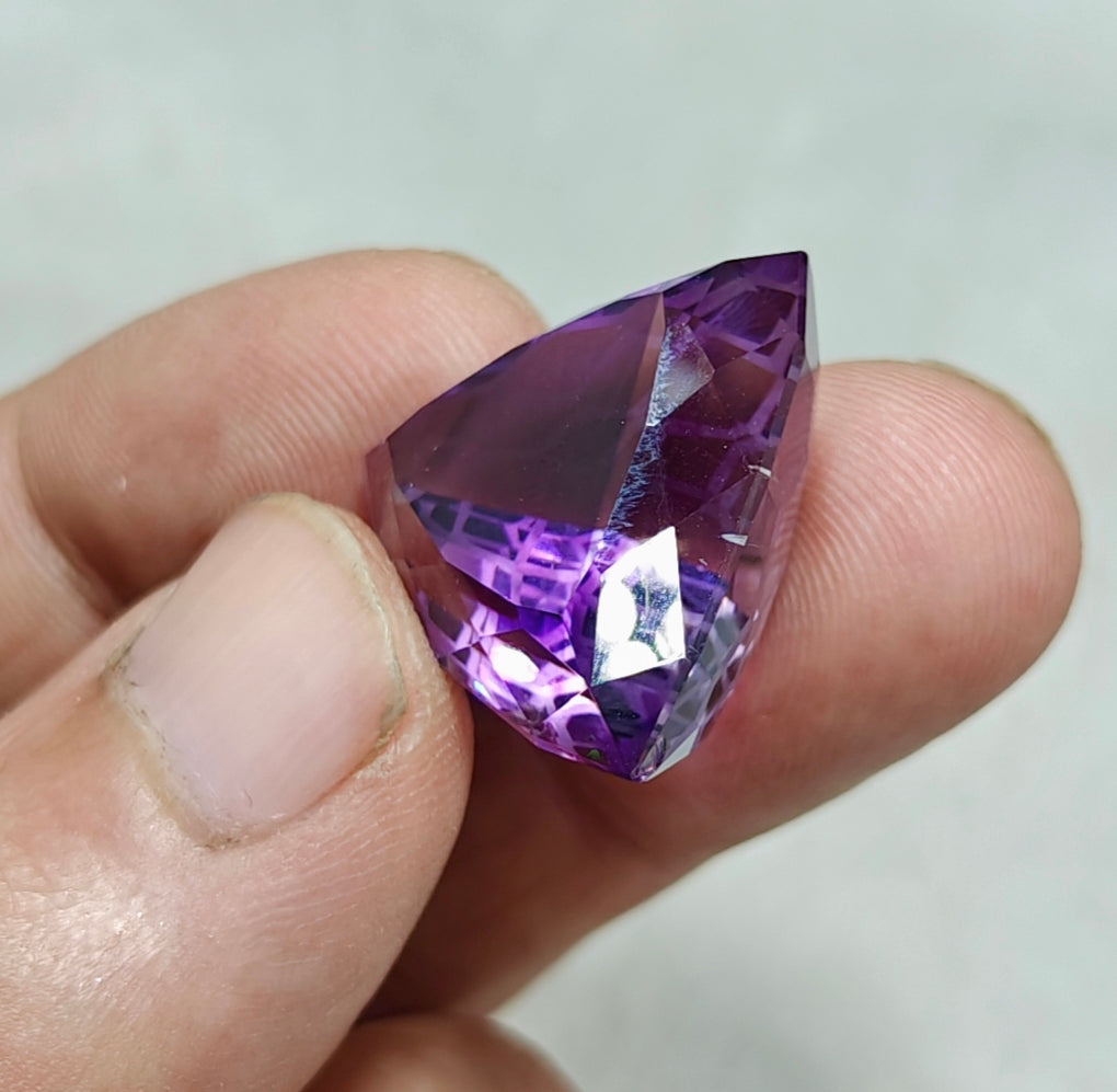 An amazing trillion fancy cut faceted amethyst gemstone 46 carats