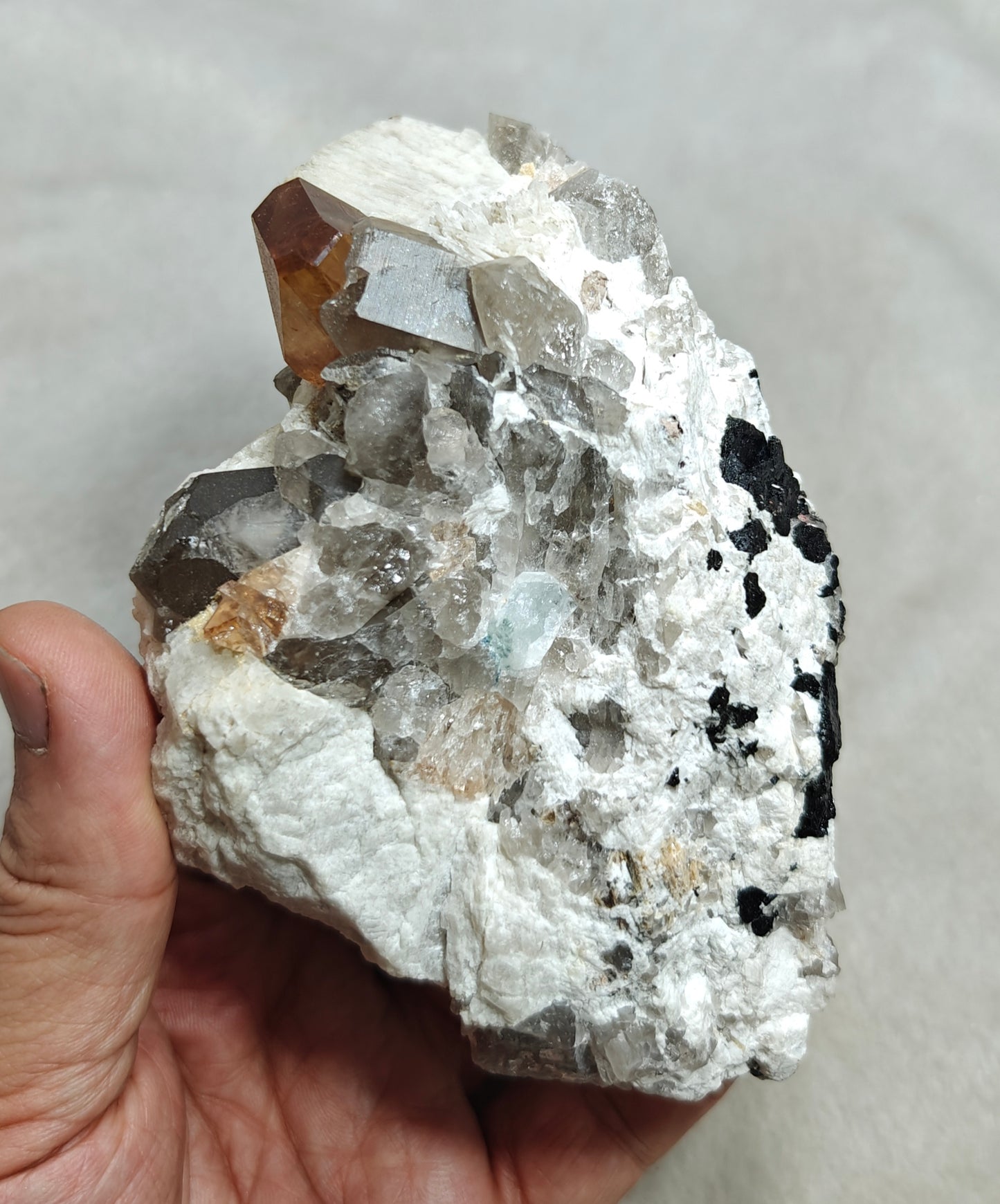 Terminated peach color Topaz crystal on matrix 576 grams