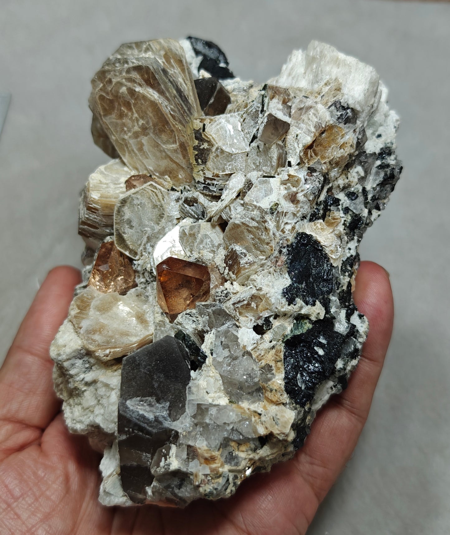 peach color Topaz crystals on matrix 686 grams