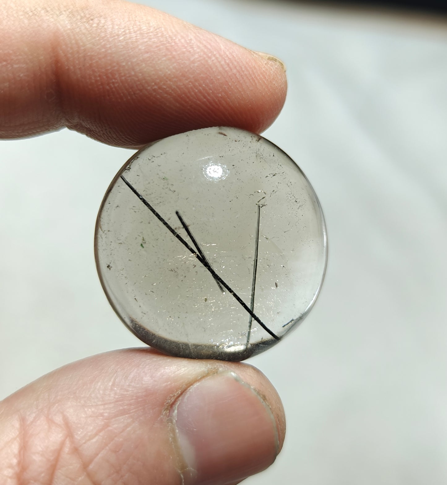 Tourmaline included smoky Quartz cabochon 64 carats