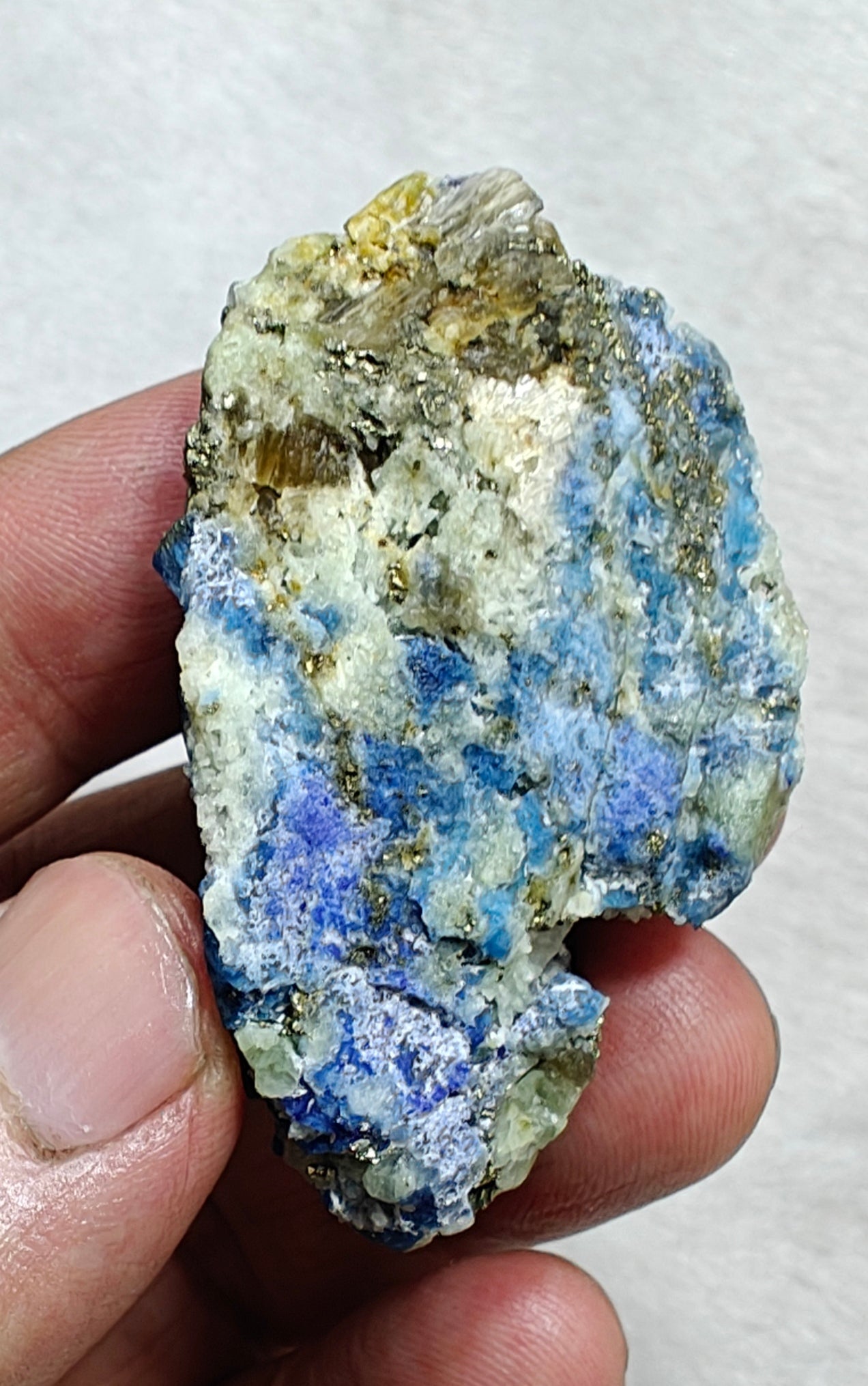Afghanite Fluorescent in matrix with some pyrite and phlogopite 41 grams