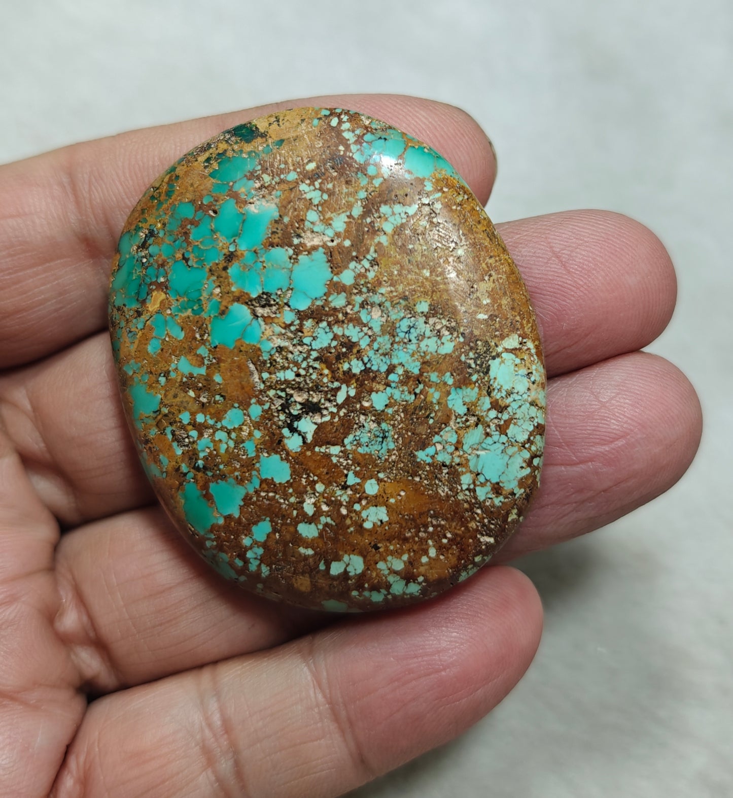 An amazing middle eastern natural turquoise Cabochon in matrix 44 grams
